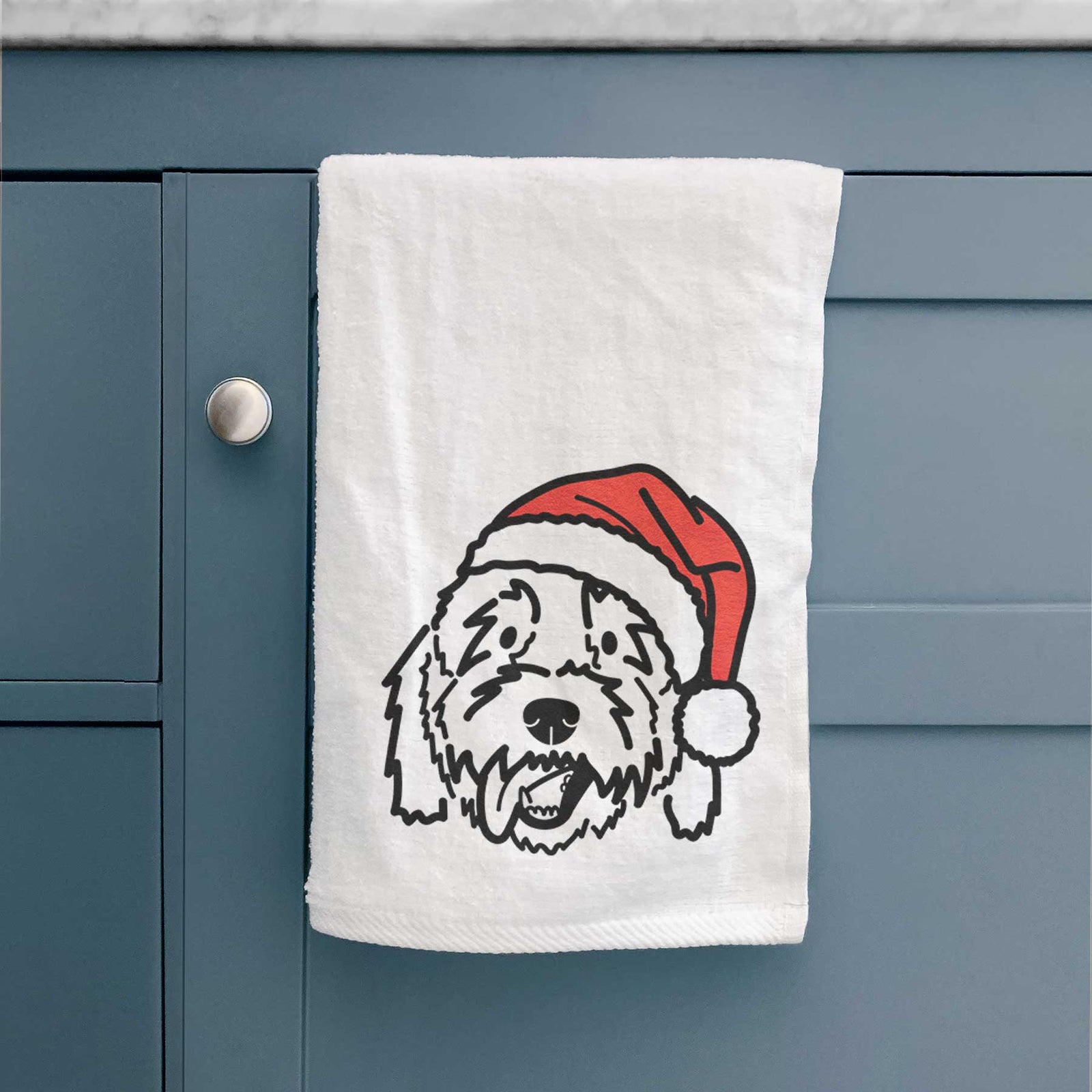 Minimalist line drawing of Barry the Goldendoodle wearing a Santa hat on a decorative hand towel