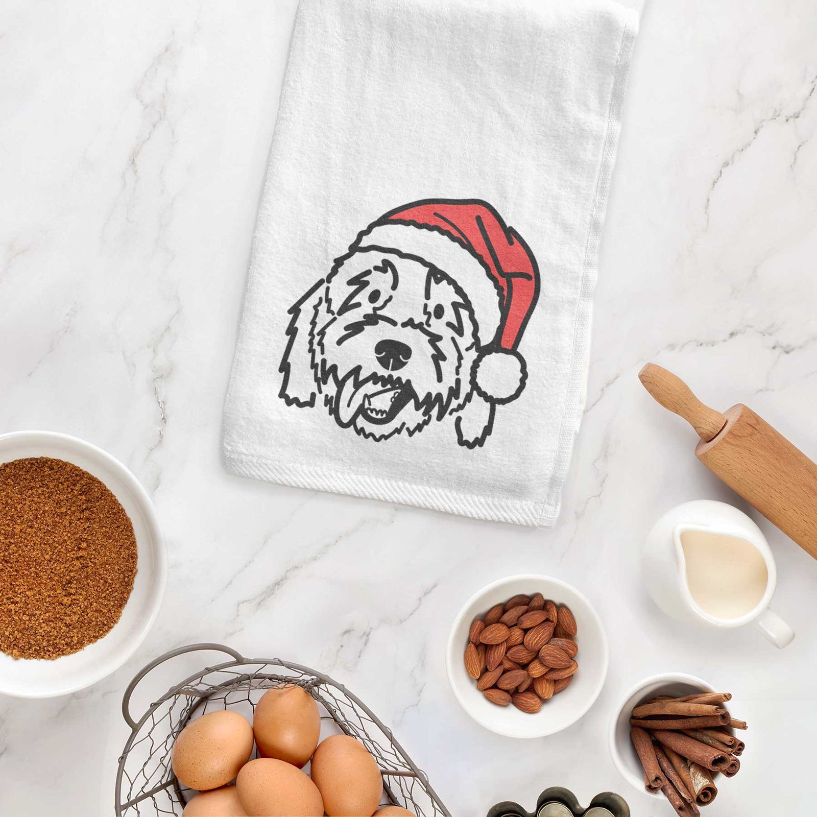 Minimalist line drawing of Barry the Goldendoodle wearing a Santa hat on a decorative hand towel