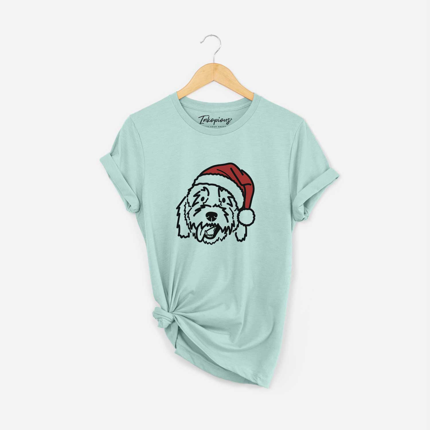 Minimalist line drawing of Barry the Goldendoodle wearing a Santa hat on a Heather Sage Unisex crewneck