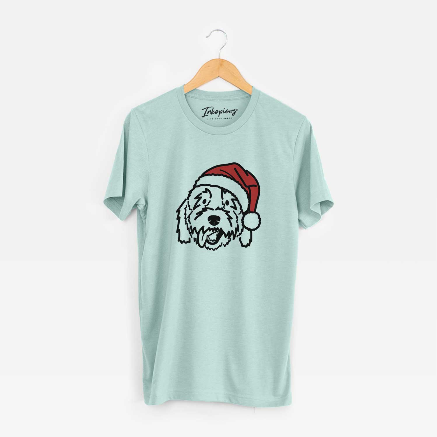 Minimalist line drawing of Barry the Goldendoodle wearing a Santa hat on a Heather Sage Unisex crewneck