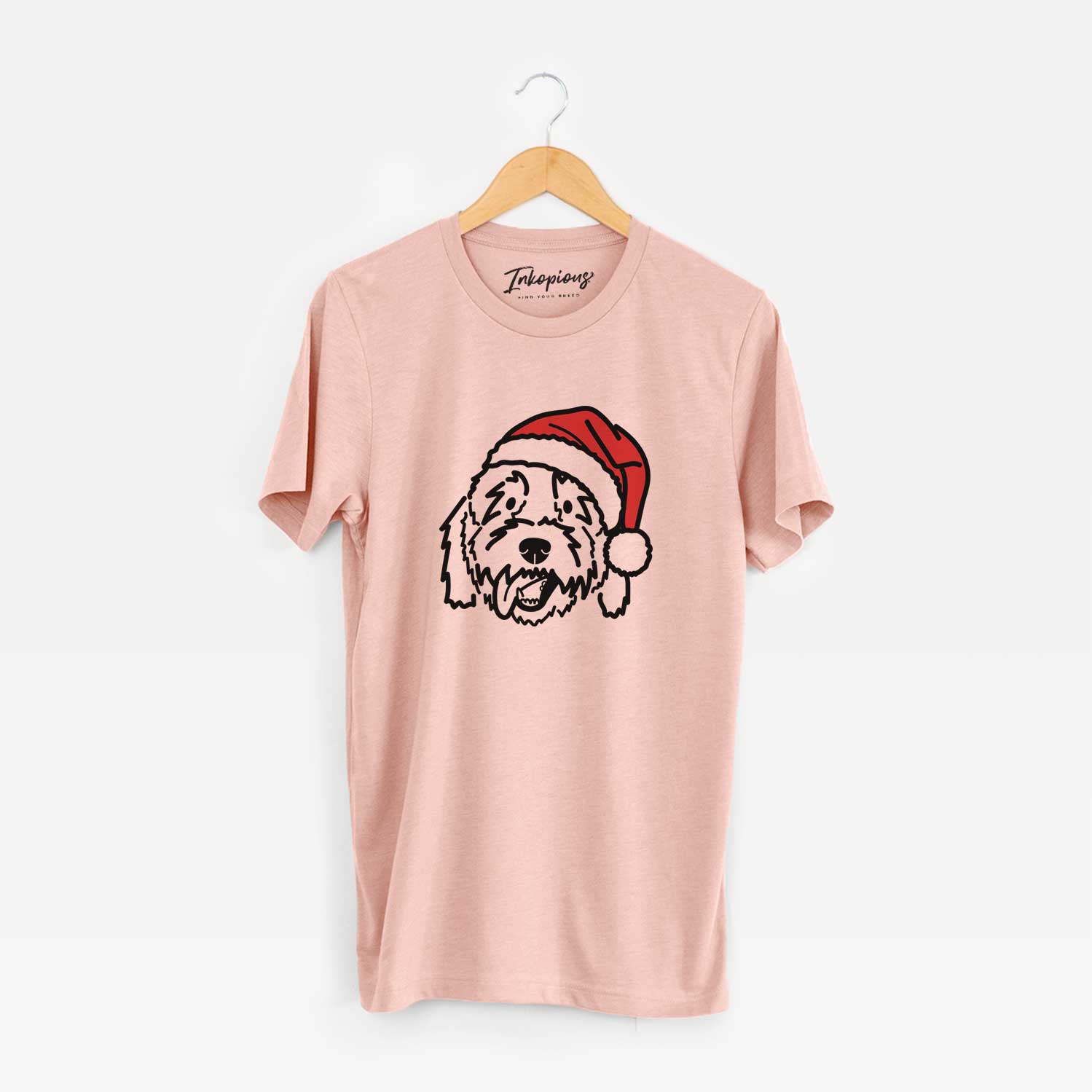 Minimalist line drawing of Barry the Goldendoodle wearing a Santa hat on a Peach Unisex crewneck