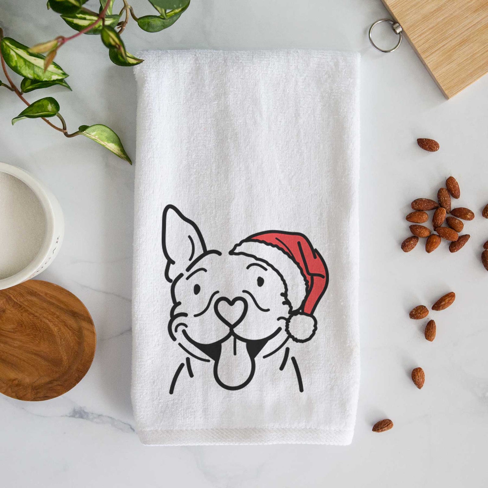 Minimalist line drawing of Basil the Pitbull wearing a Santa hat on a decorative hand towel