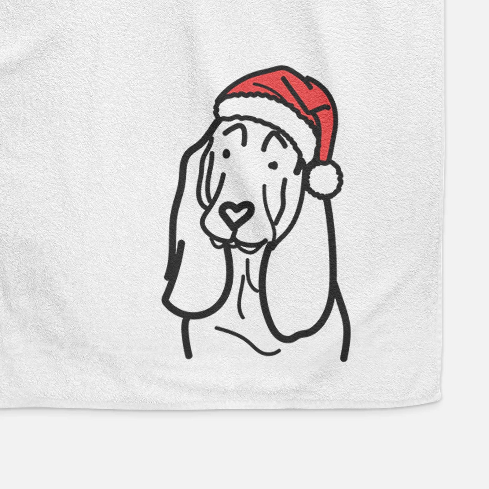 Minimalist line drawing of a Basset Hound wearing a Santa hat on a decorative hand towel