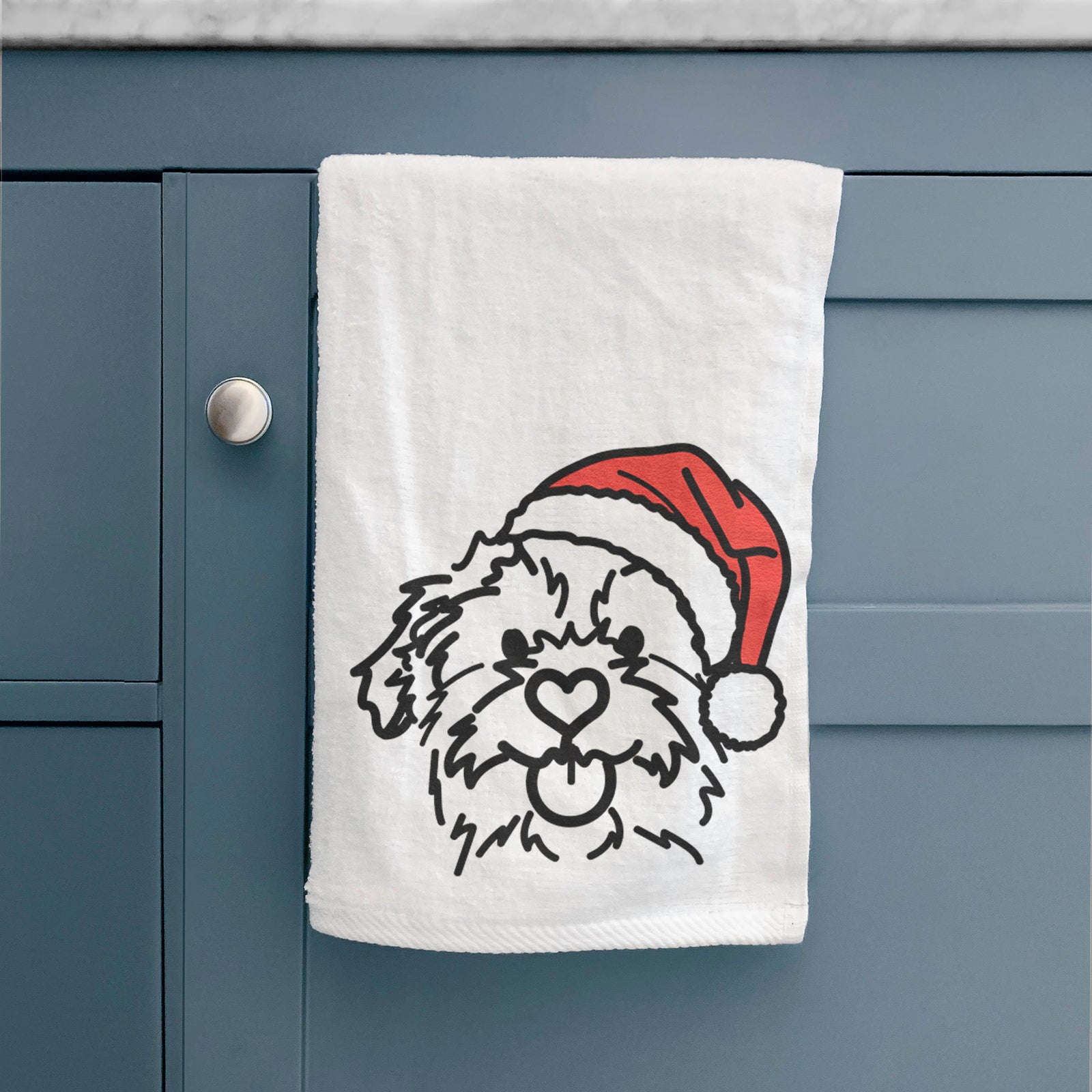 Minimalist line drawing of Bea the Mixed Breed wearing a Santa hat on a decorative hand towel