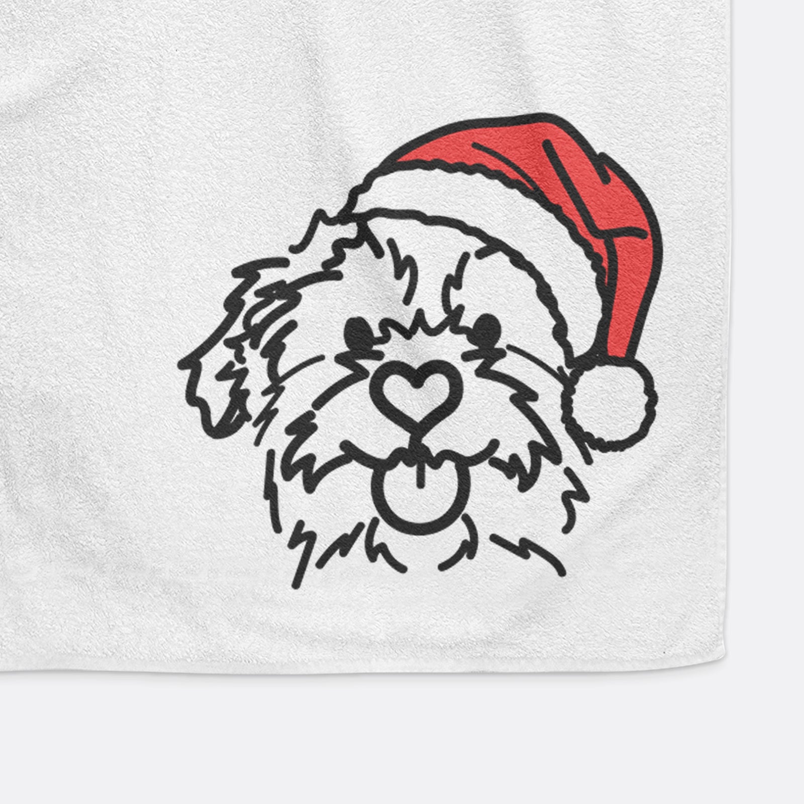 Minimalist line drawing of Bea the Mixed Breed wearing a Santa hat on a decorative hand towel