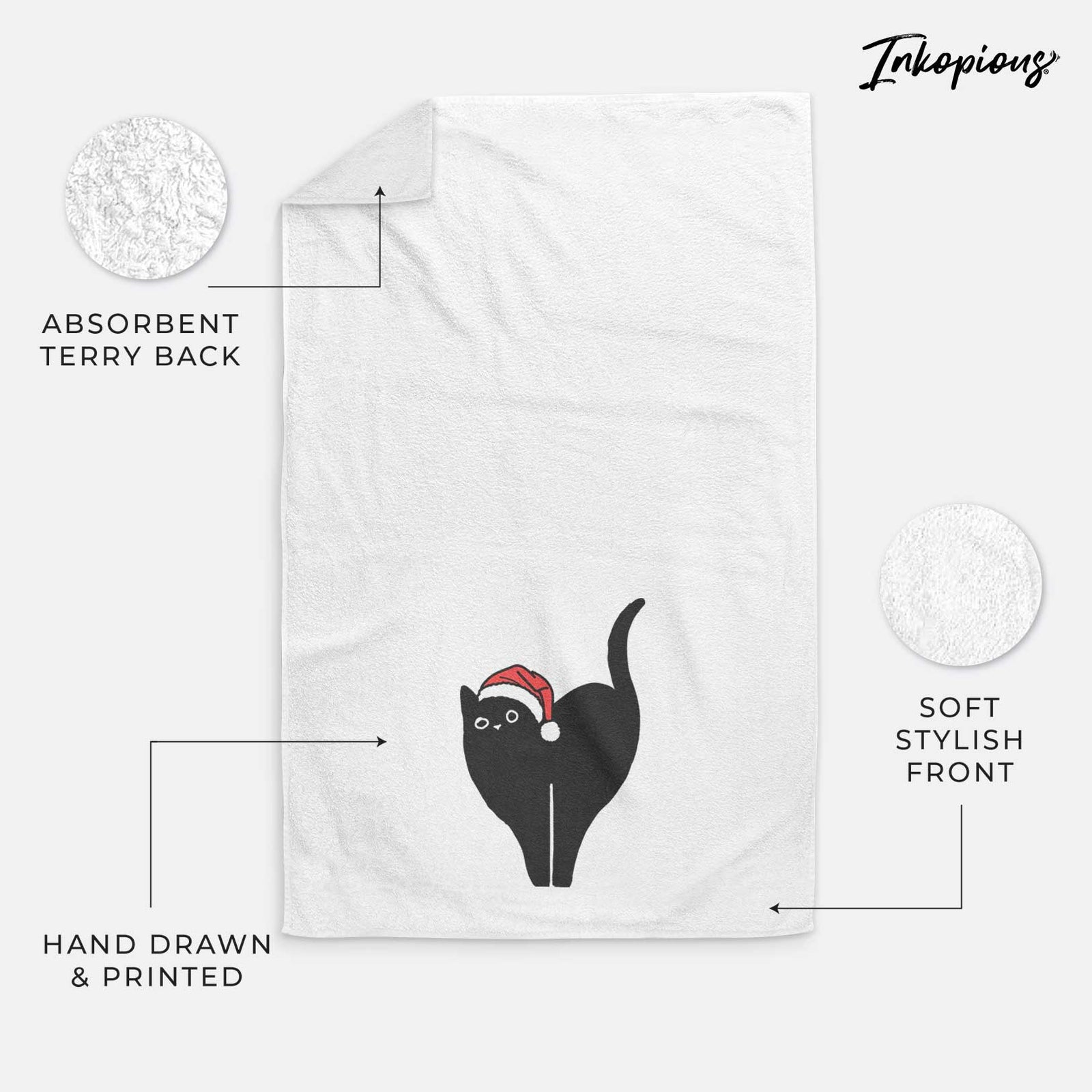 Minimalist line drawing of Bella the Black Cat wearing a Santa hat on a decorative hand towel