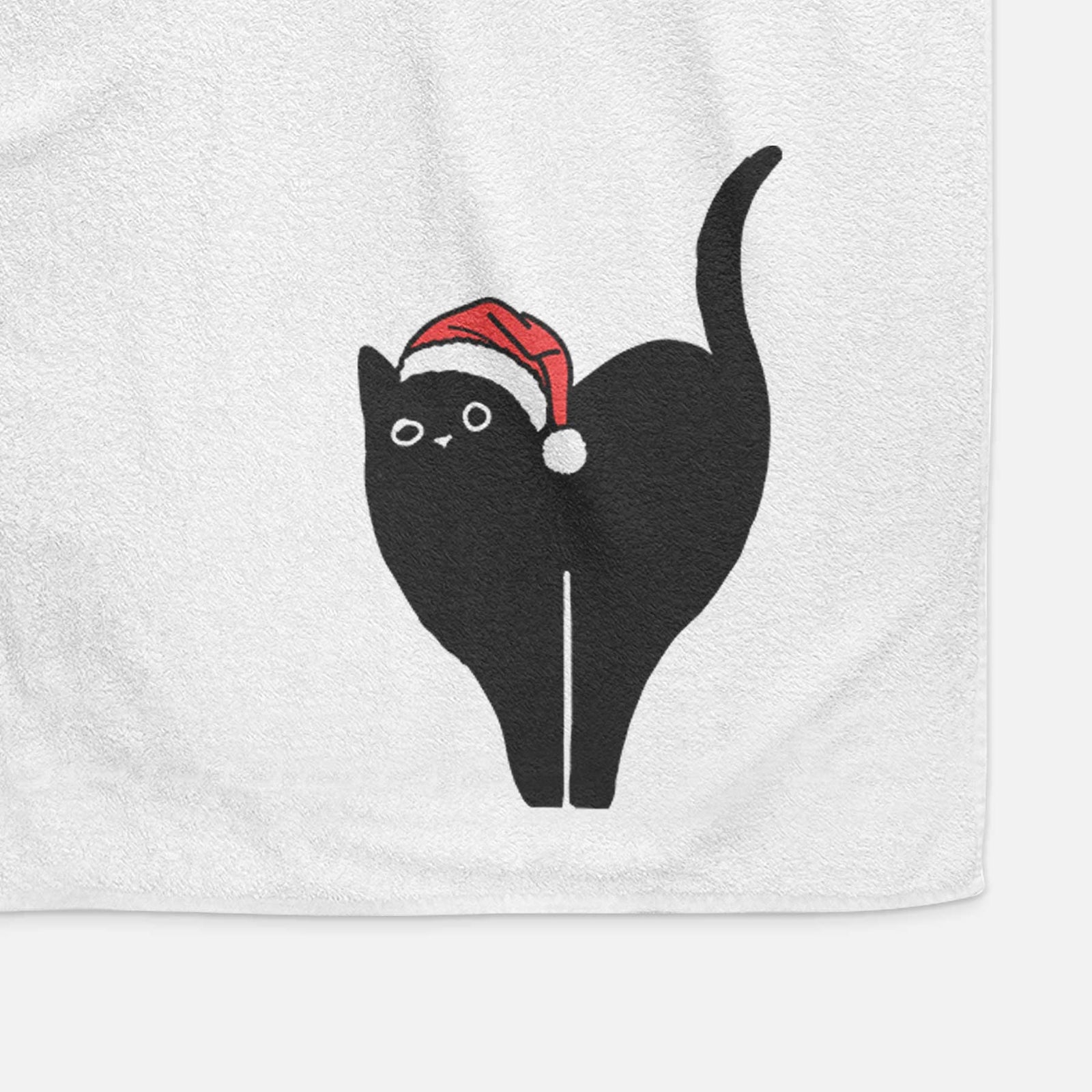 Minimalist line drawing of Bella the Black Cat wearing a Santa hat on a decorative hand towel