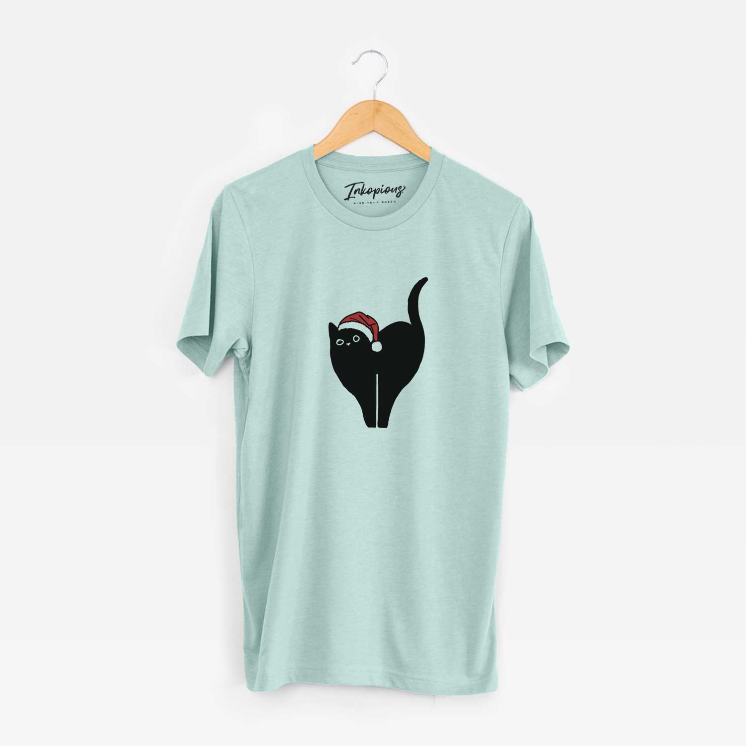 Minimalist line drawing of Bella the Black Cat wearing a Santa hat on a Heather Sage Unisex crewneck