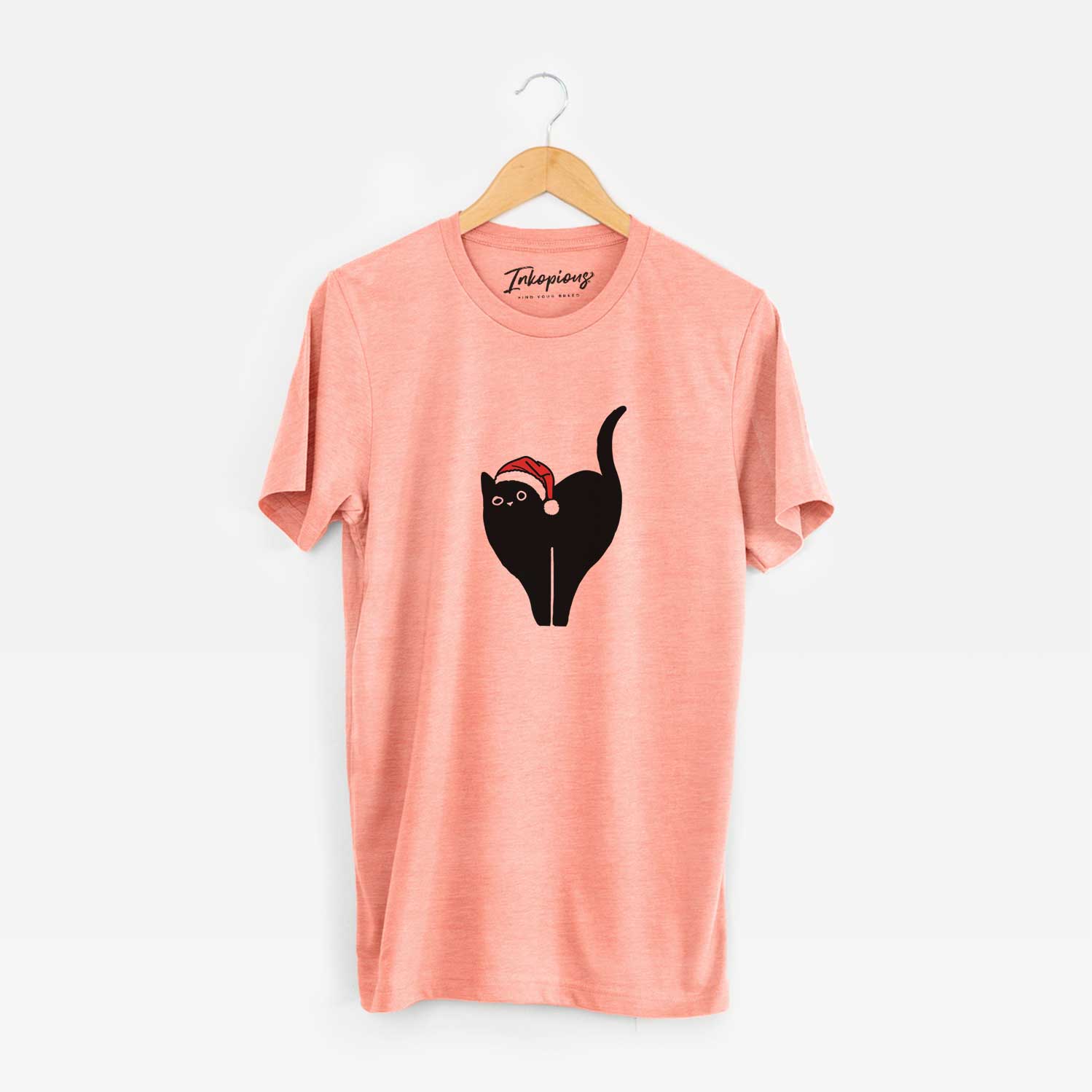 Minimalist line drawing of Bella the Black Cat wearing a Santa hat on a Sunset Unisex crewneck