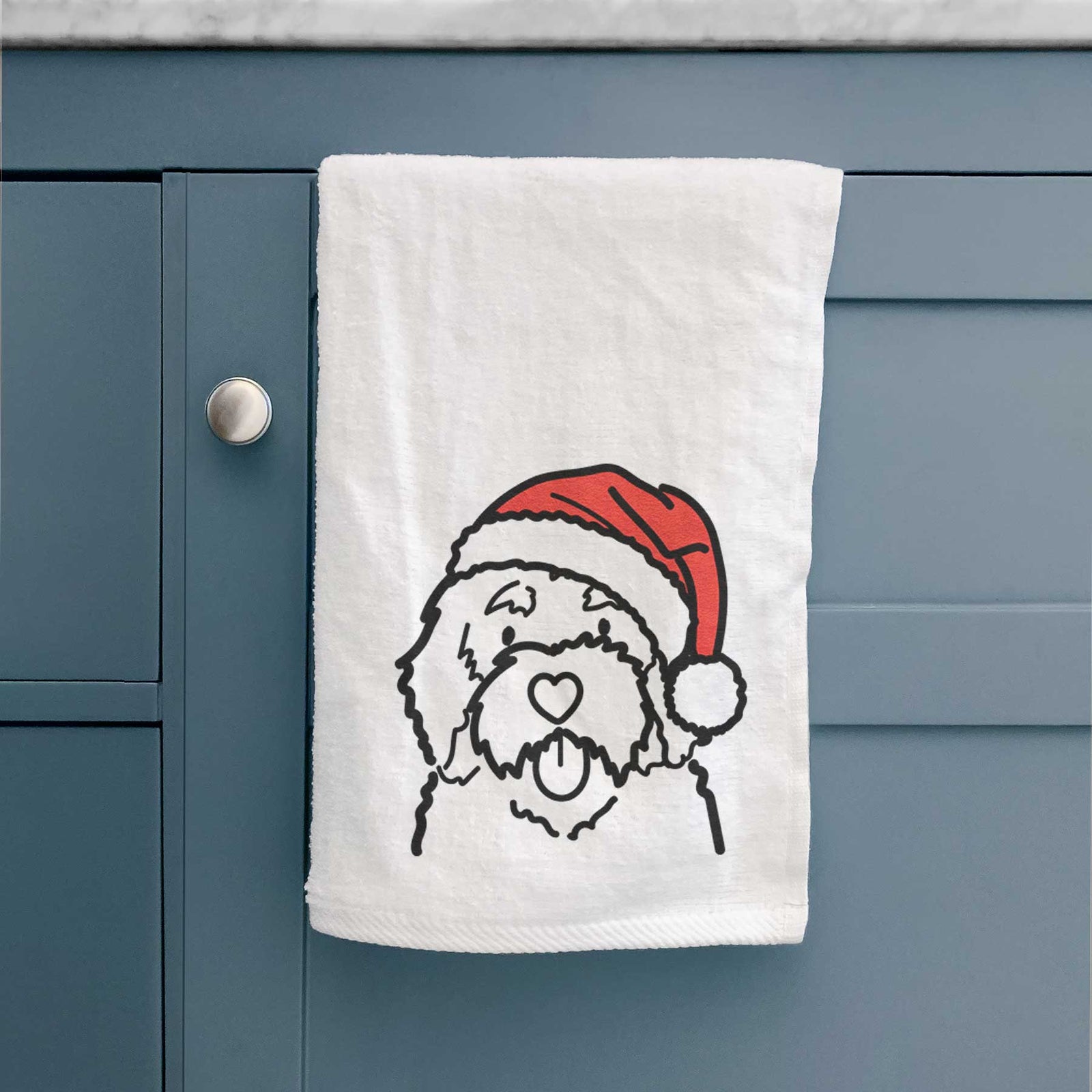 Minimalist line drawing of a Bernedoodle wearing a Santa hat on a decorative hand towel