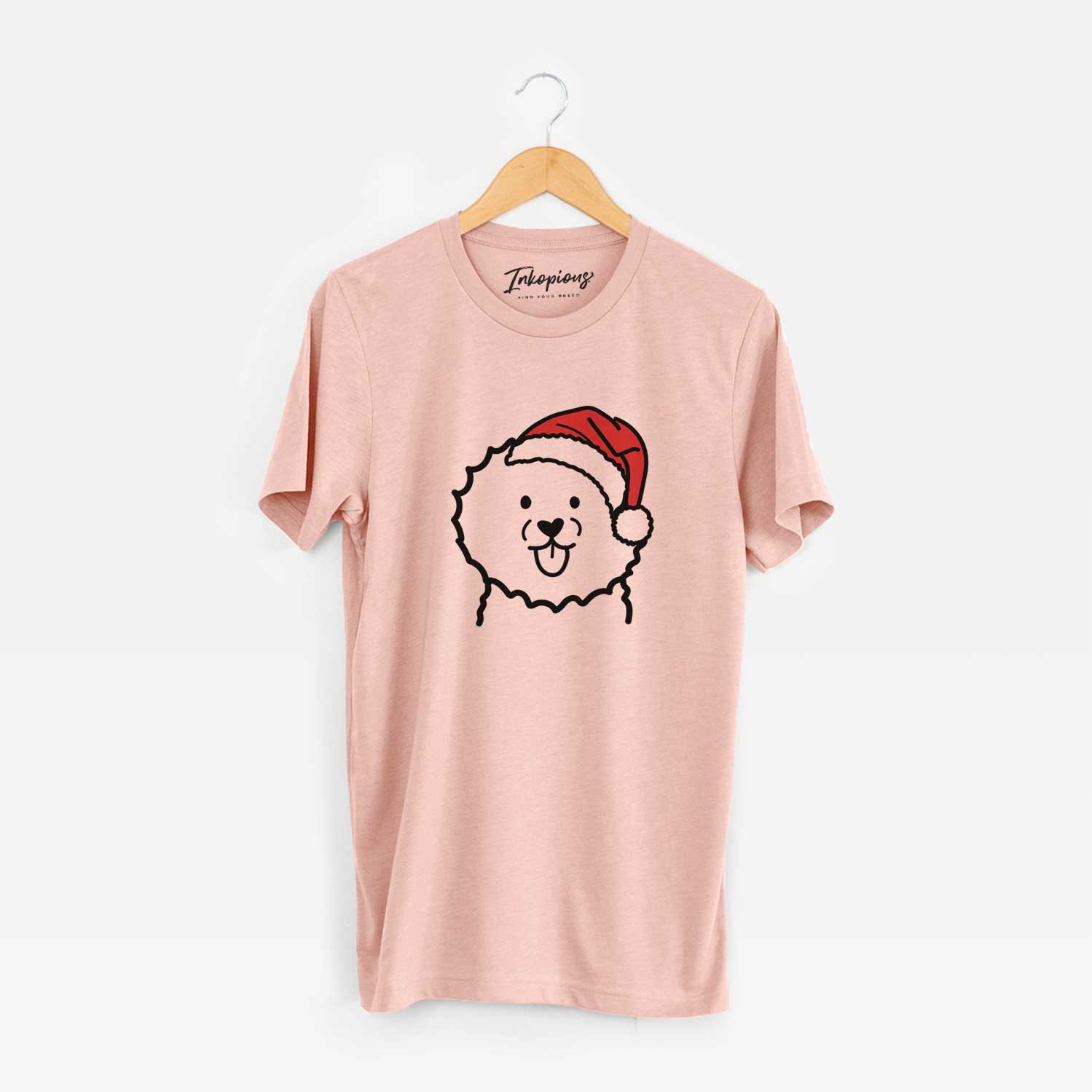 Minimalist line drawing of a Bichon Frise wearing a Santa hat on a Peach Unisex crewneck