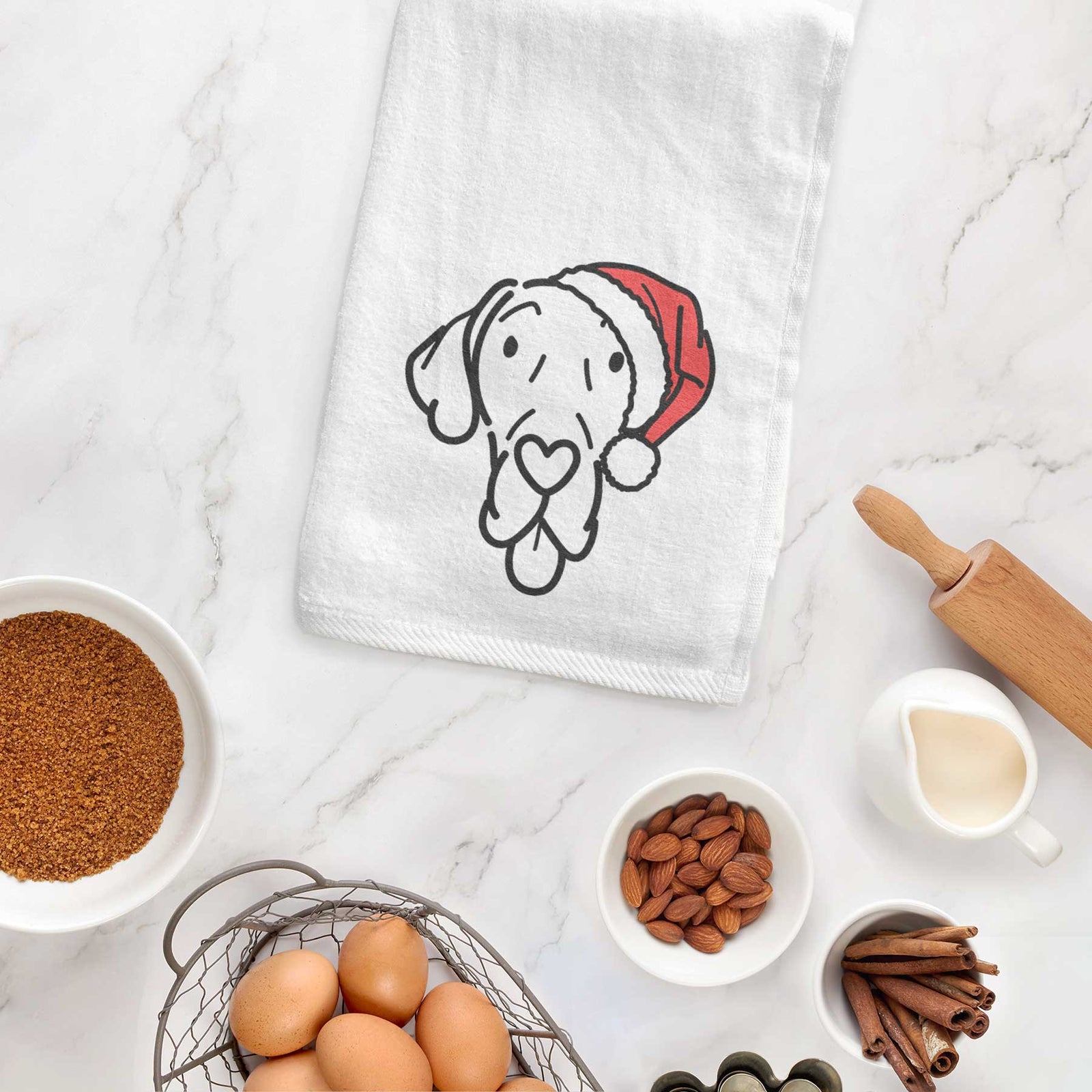 Minimalist line drawing of Bruce the Great Dane wearing a Santa hat on a decorative hand towel