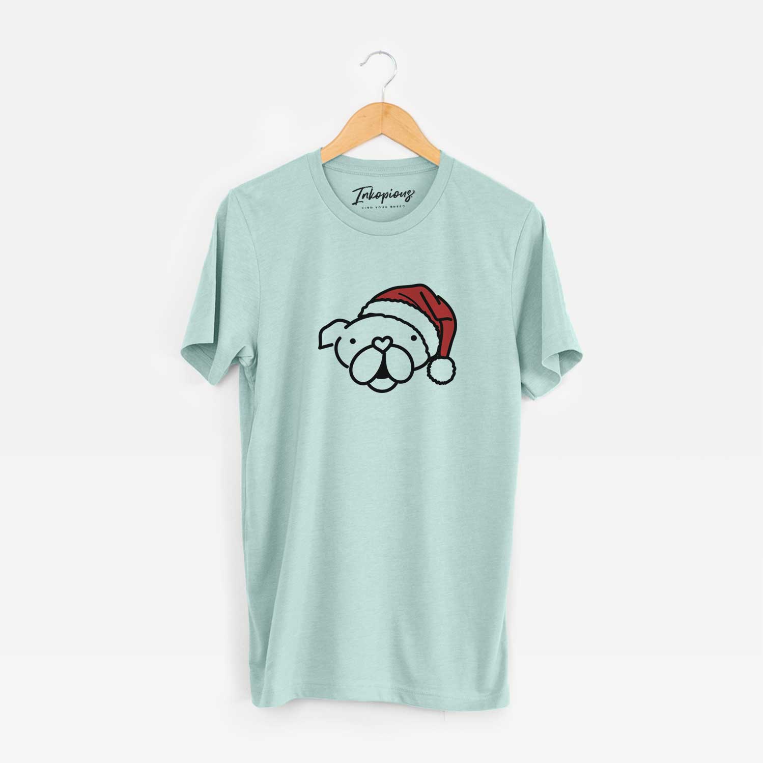 Minimalist line drawing of an English Bulldog wearing a Santa hat on a Heather Sage Unisex crewneck
