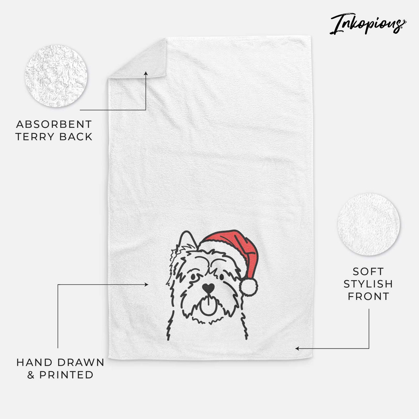 Minimalist line drawing of a Cairn Terrier wearing a Santa hat on a decorative hand towel