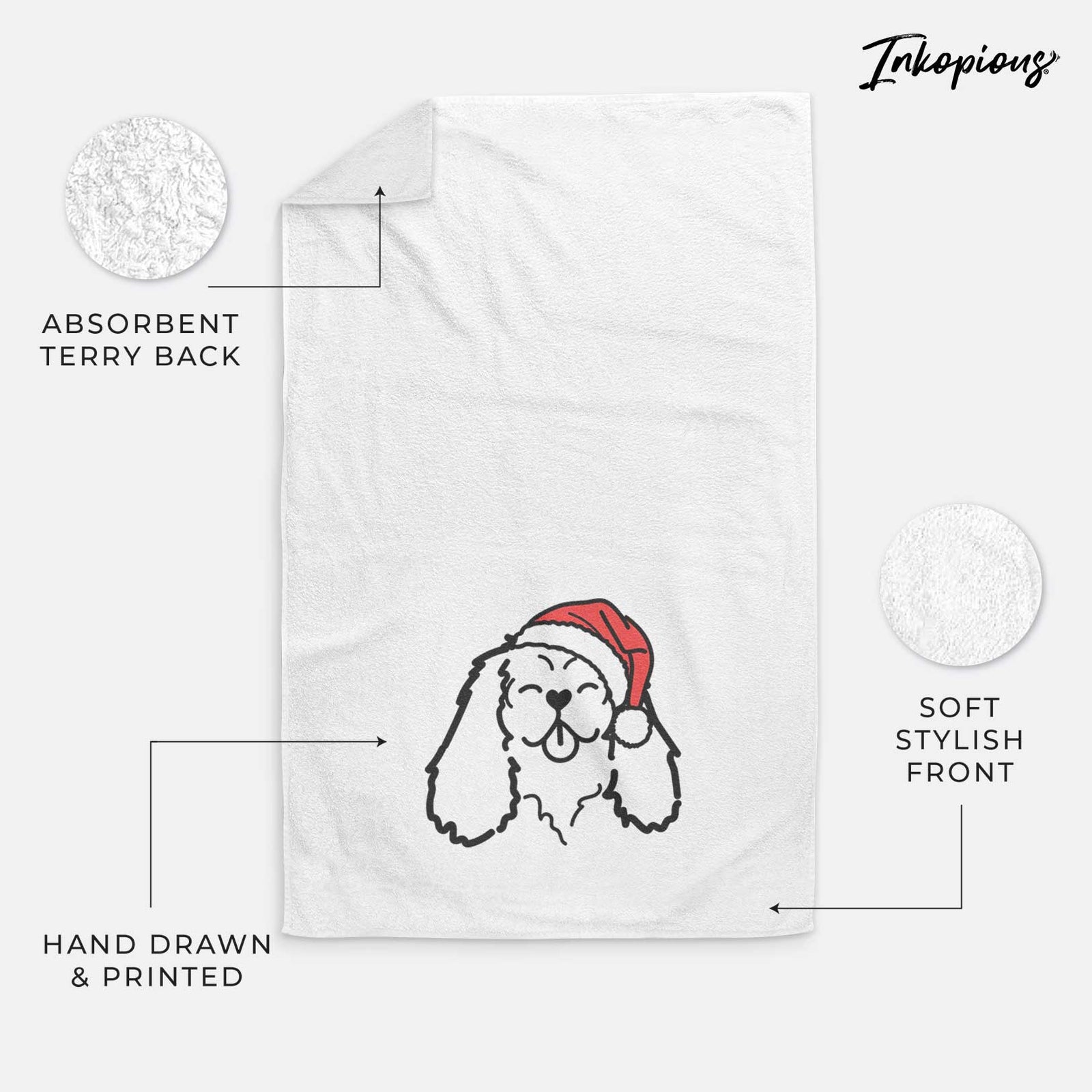 Minimalist line drawing of a Cavalier King Charles Spaniel wearing a Santa hat on a decorative hand towel