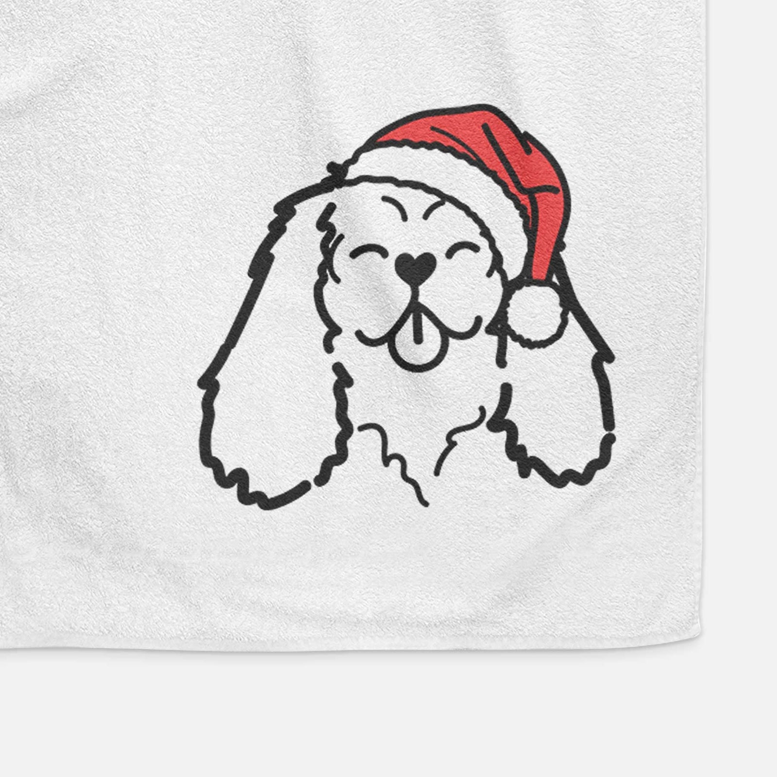 Minimalist line drawing of a Cavalier King Charles Spaniel wearing a Santa hat on a decorative hand towel
