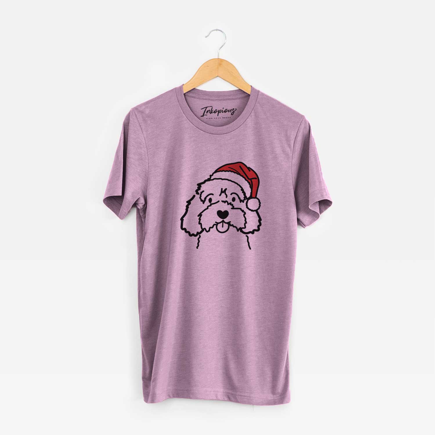 Minimalist line drawing of a Cavapoo wearing a Santa hat on an Orchid Unisex crewneck