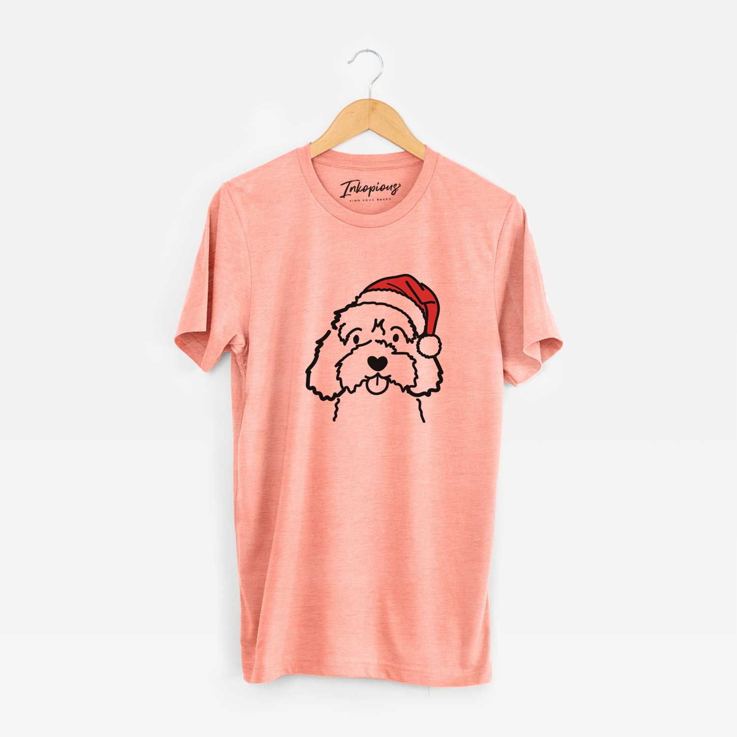 Minimalist line drawing of a Cavapoo wearing a Santa hat on a Sunset Unisex crewneck