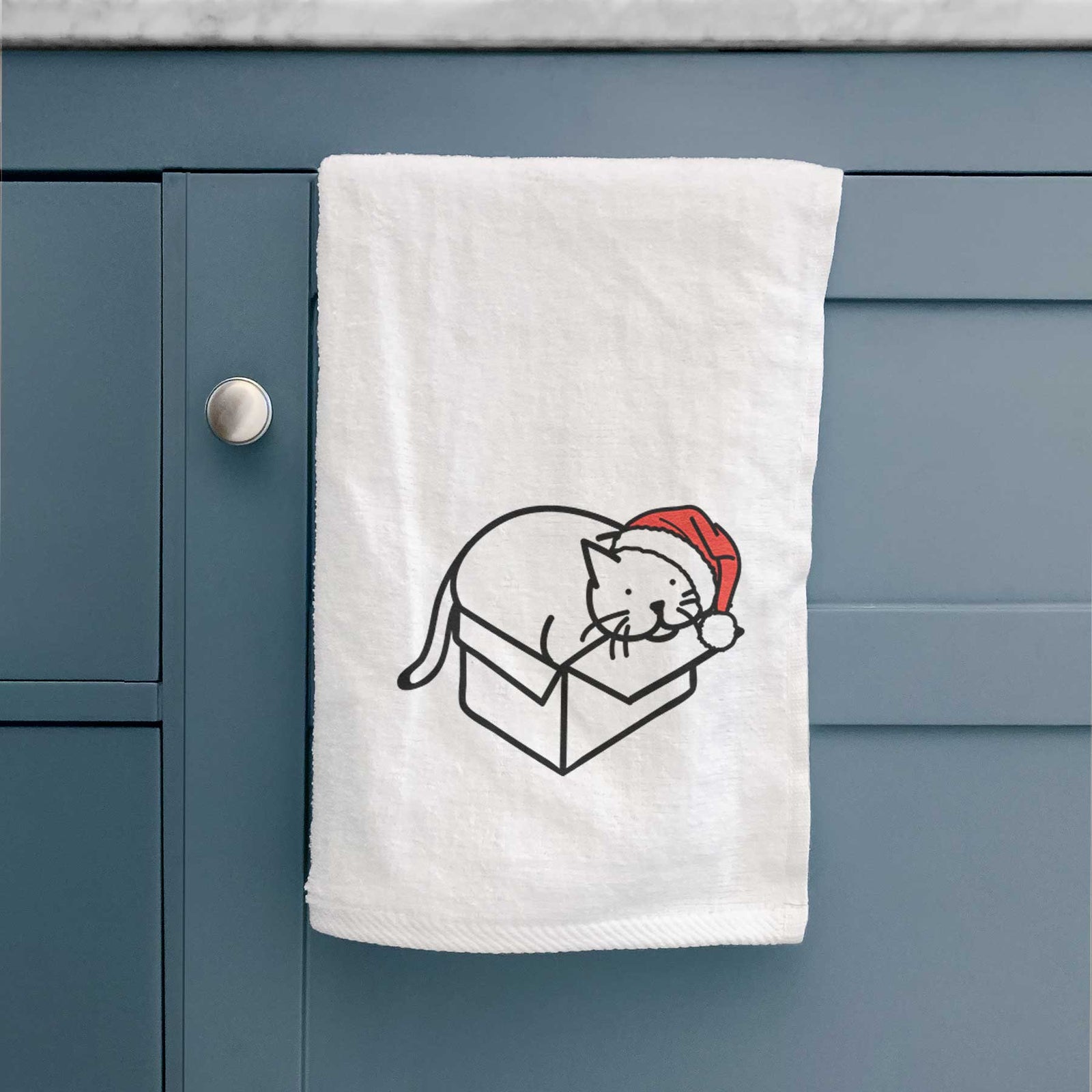 Minimalist line drawing of Charlie the Cat in a Box wearing a Santa hat on a decorative hand towel
