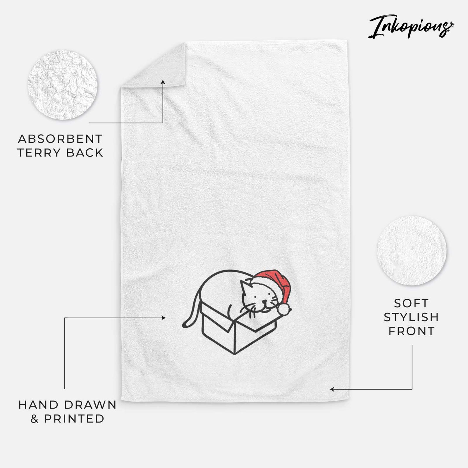 Minimalist line drawing of Charlie the Cat in a Box wearing a Santa hat on a decorative hand towel