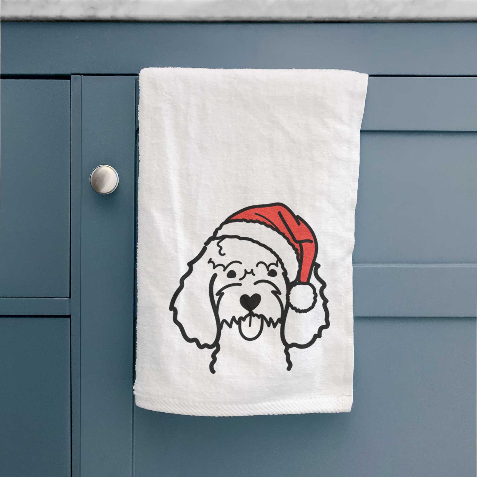 Minimalist line drawing of a Cockapoo wearing a Santa hat on a decorative hand towel