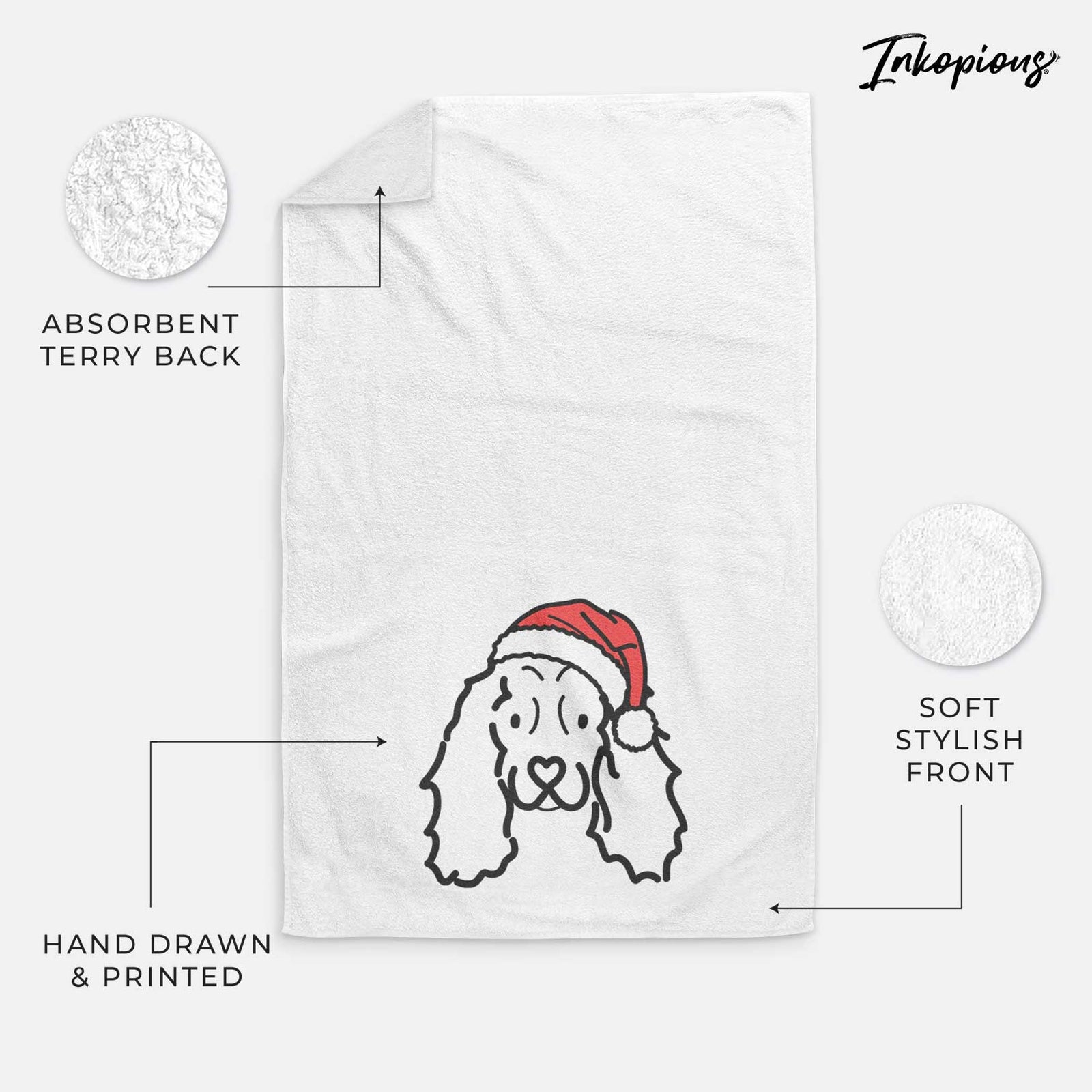 Minimalist line drawing of an American Cocker Spaniel wearing a Santa hat on a decorative hand towel