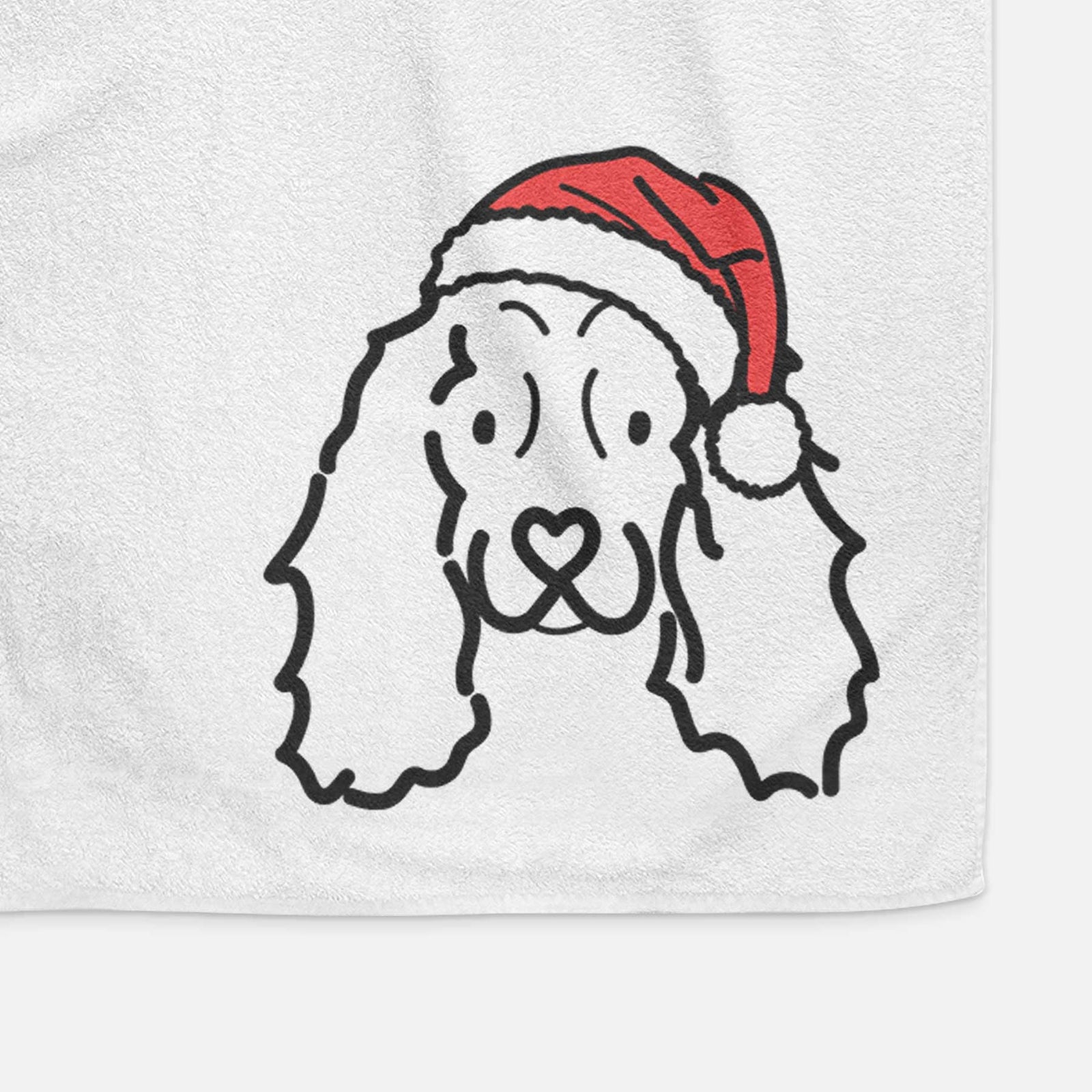Minimalist line drawing of an American Cocker Spaniel wearing a Santa hat on a decorative hand towel