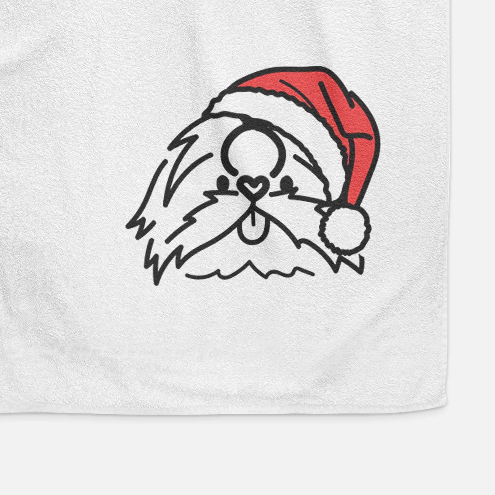 Minimalist line drawing of CoCo the Shih Tzu wearing a Santa hat on a decorative hand towel
