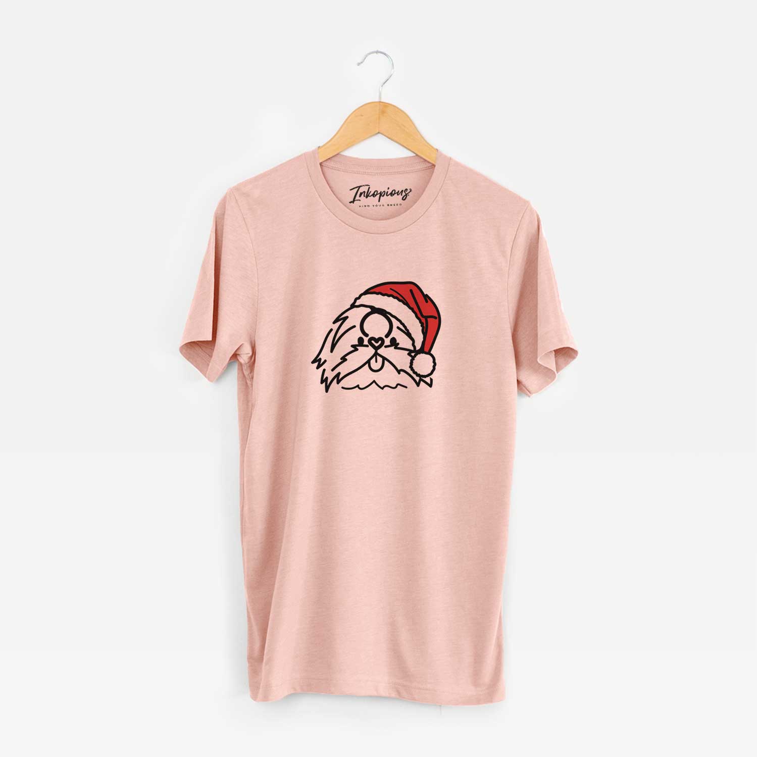 Minimalist line drawing of CoCo the Shih Tzu wearing a Santa hat on a Peach Unisex crewneck