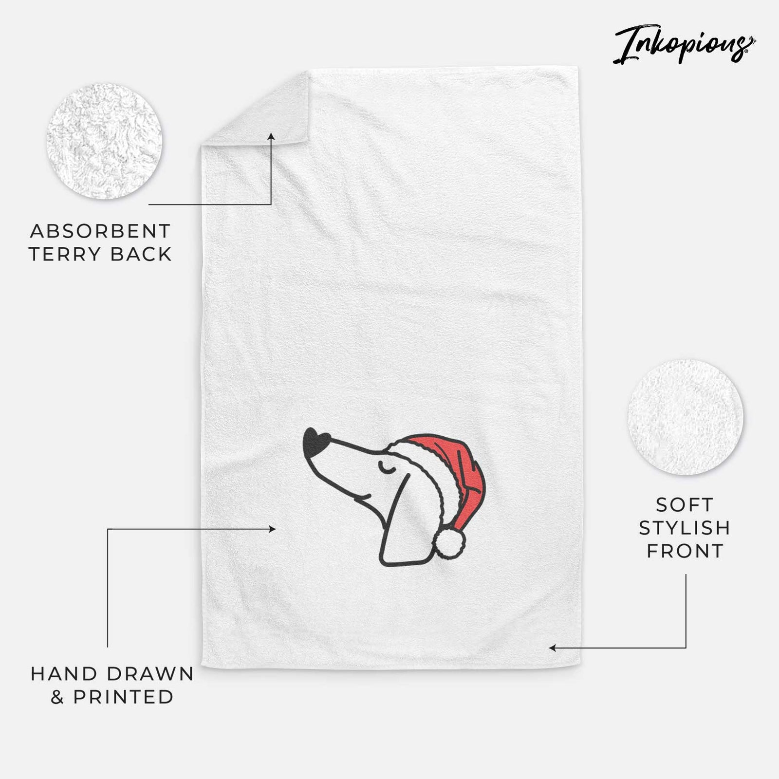 Minimalist line drawing of a Dachshund wearing a Santa hat on a decorative hand towel