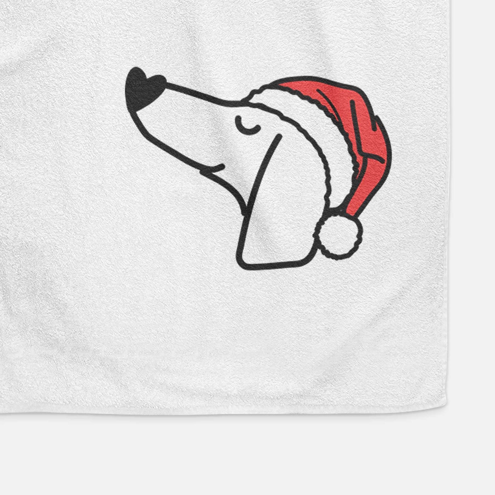 Minimalist line drawing of a Dachshund wearing a Santa hat on a decorative hand towel