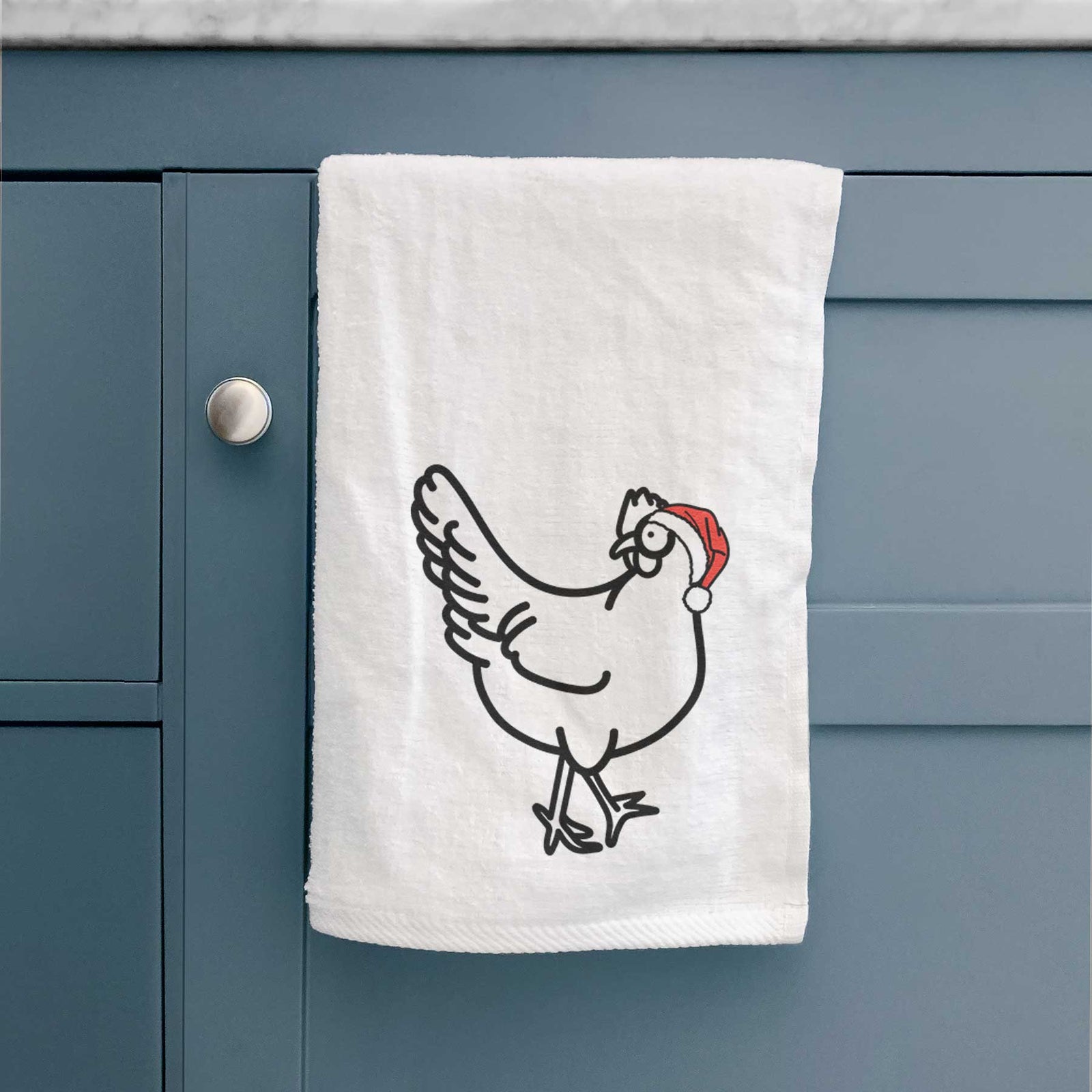Minimalist line drawing of Daisy the Chicken wearing a Santa hat on a decorative hand towel