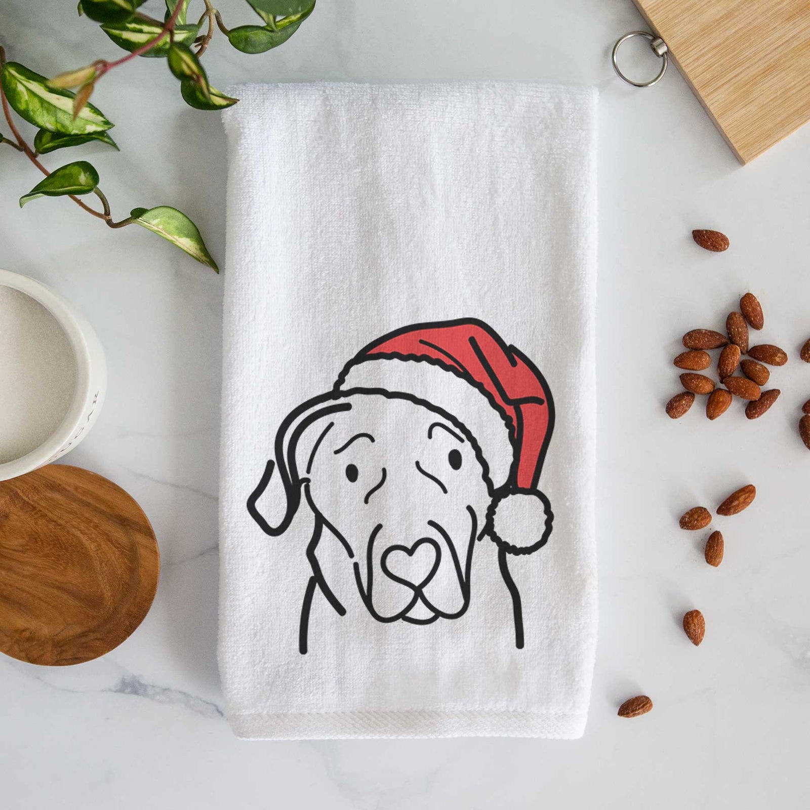 Minimalist line drawing of an English Labrador wearing a Santa hat on a decorative hand towel