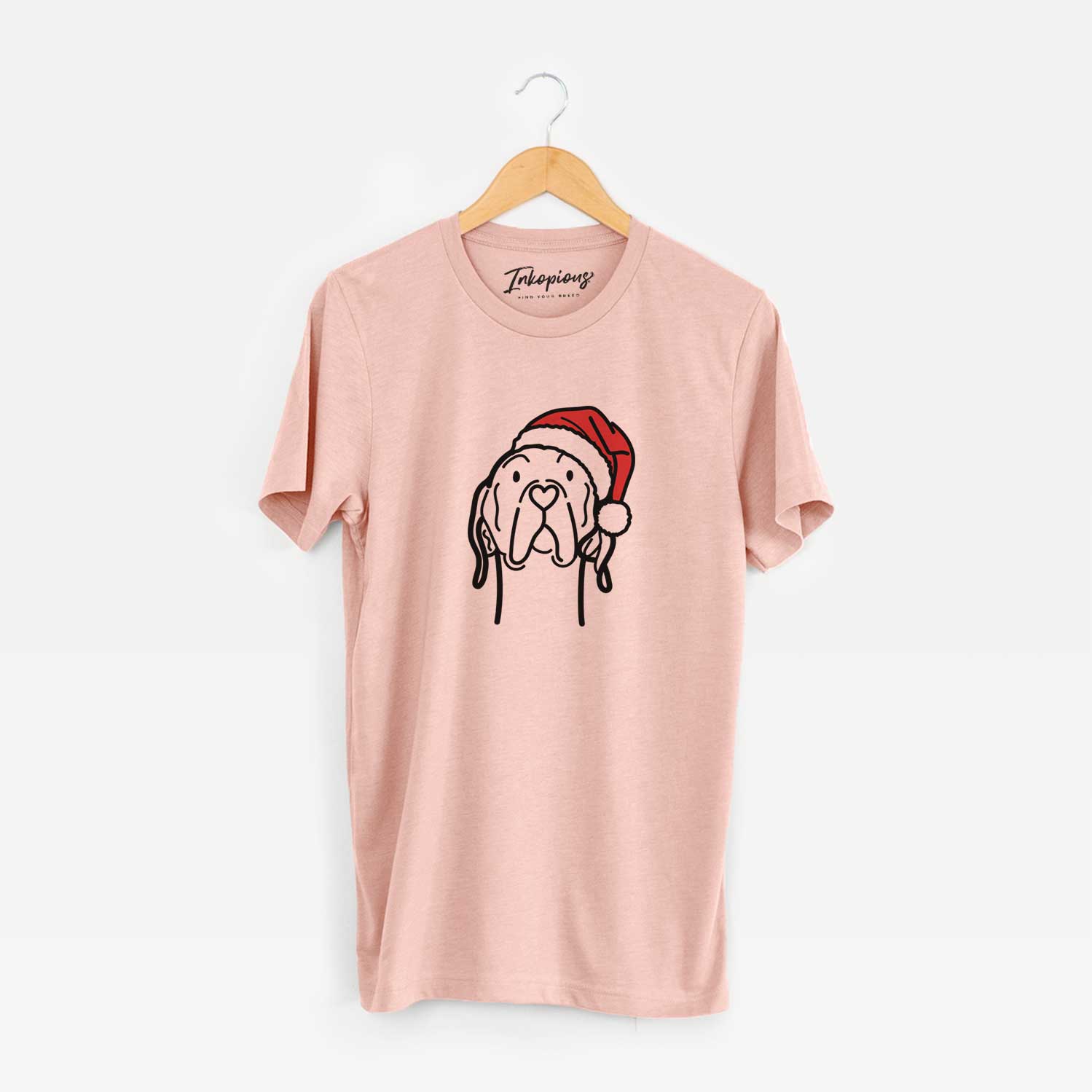 Minimalist line drawing of an English Pointer wearing a Santa hat on a Peach Unisex crewneck