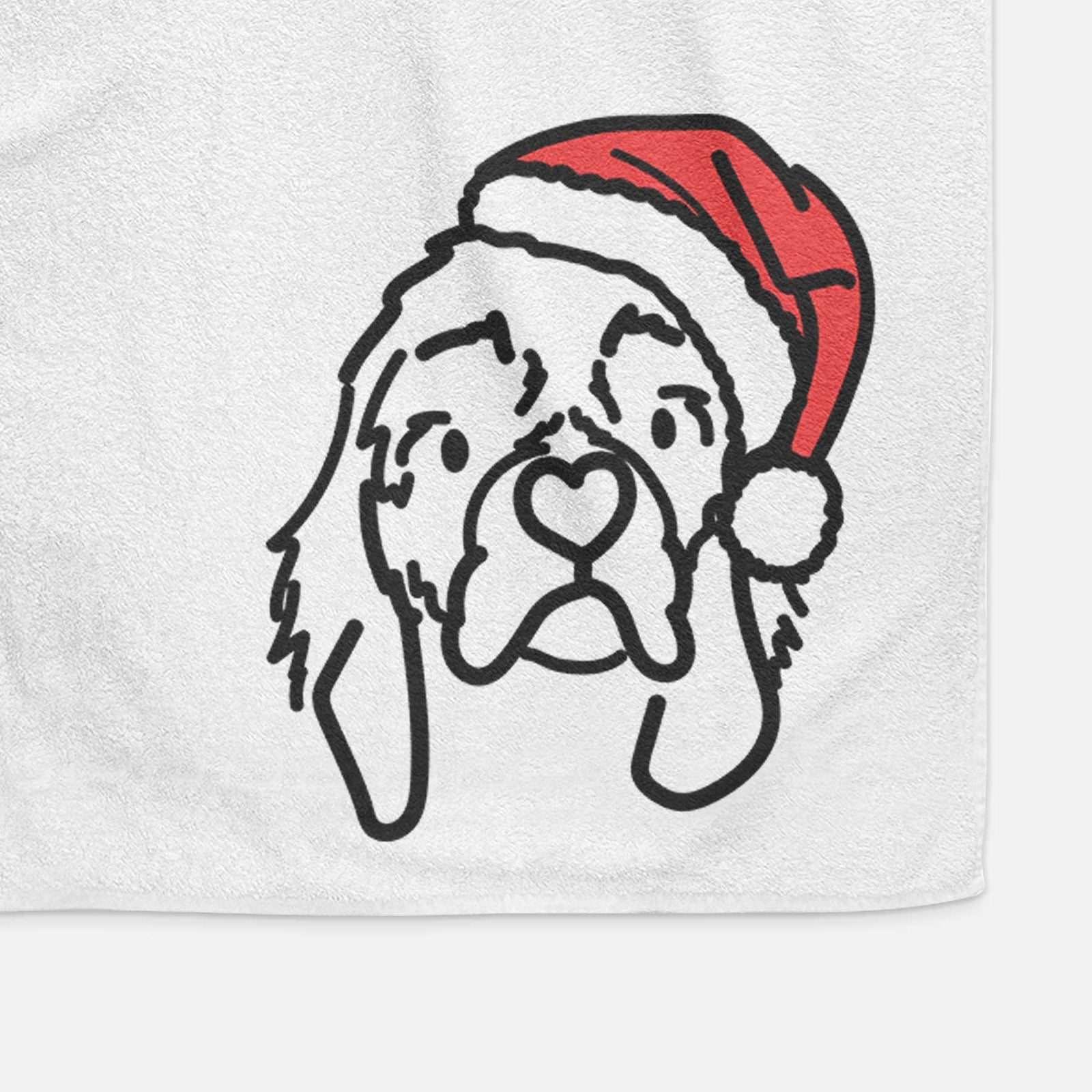 Minimalist line drawing of GiGi the Cocker Spaniel wearing a Santa hat on a decorative hand towel