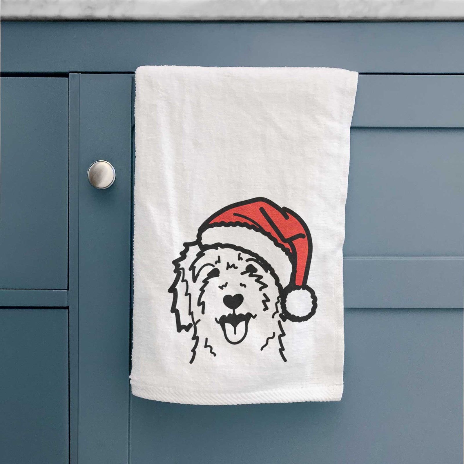 Minimalist line drawing of a Goldendoodle wearing a Santa hat on a decorative hand towel