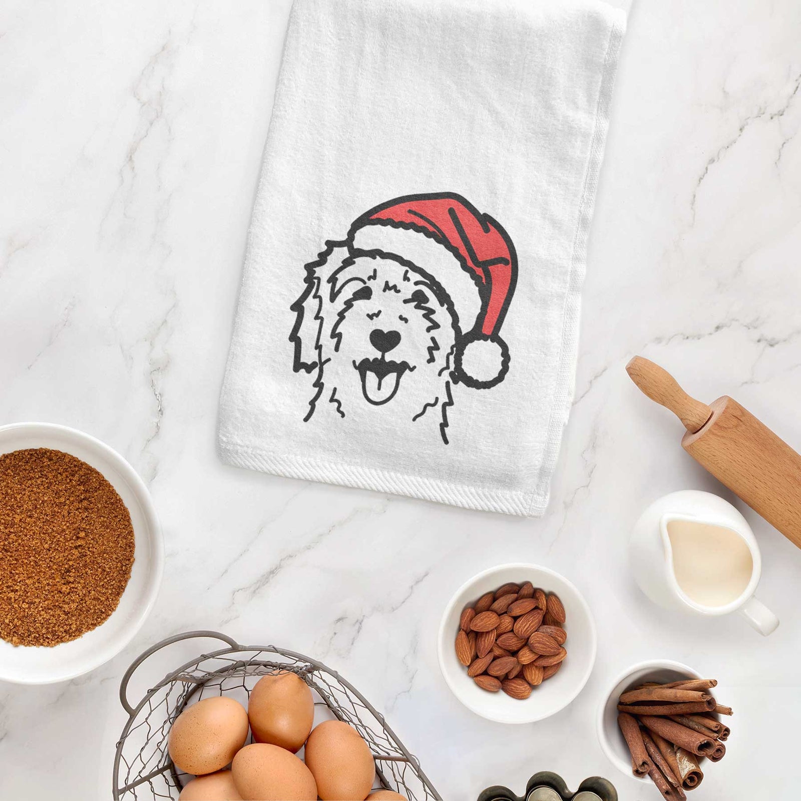Minimalist line drawing of a Goldendoodle wearing a Santa hat on a decorative hand towel