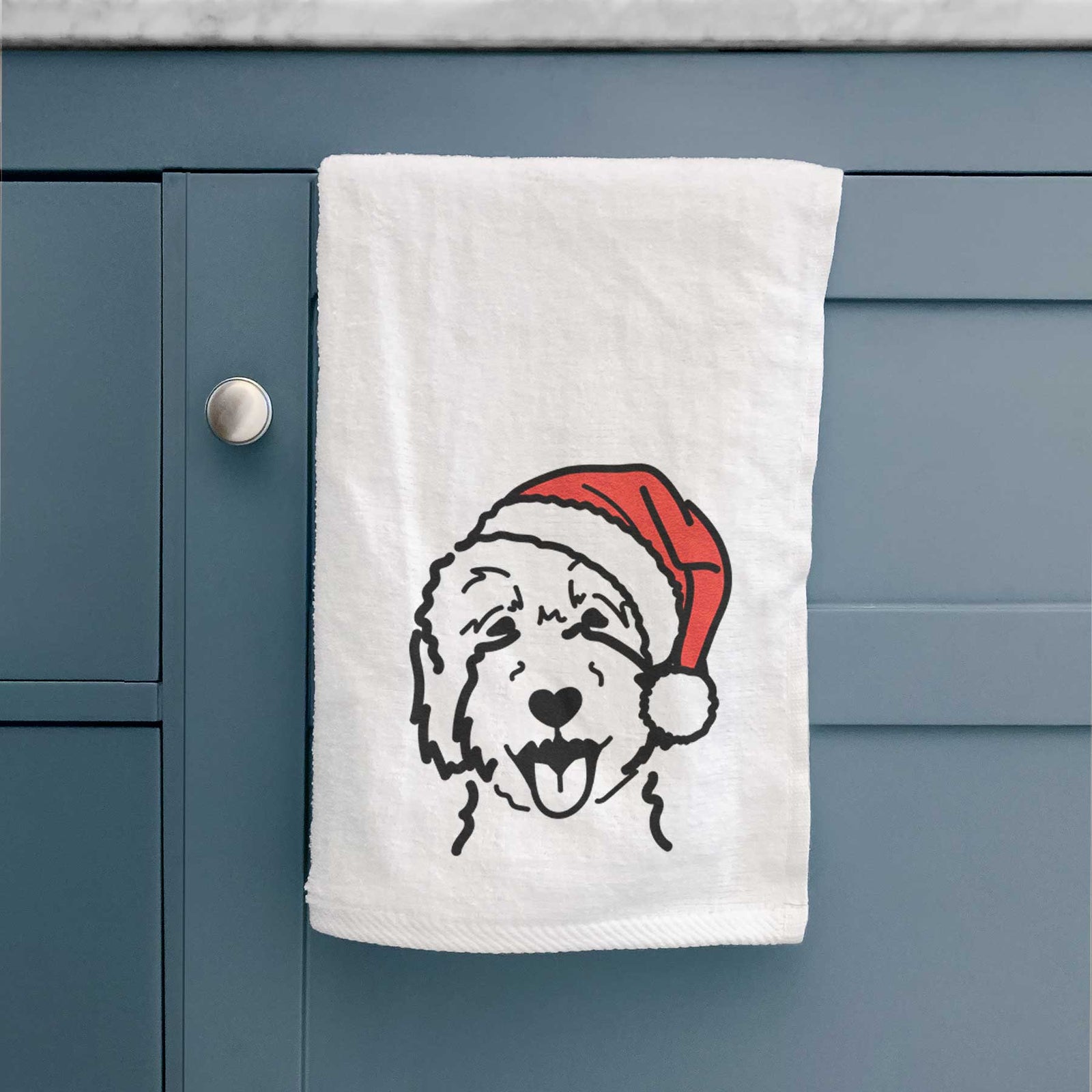 Minimalist line drawing of a Goldendoodle 2 wearing a Santa hat on a decorative hand towel