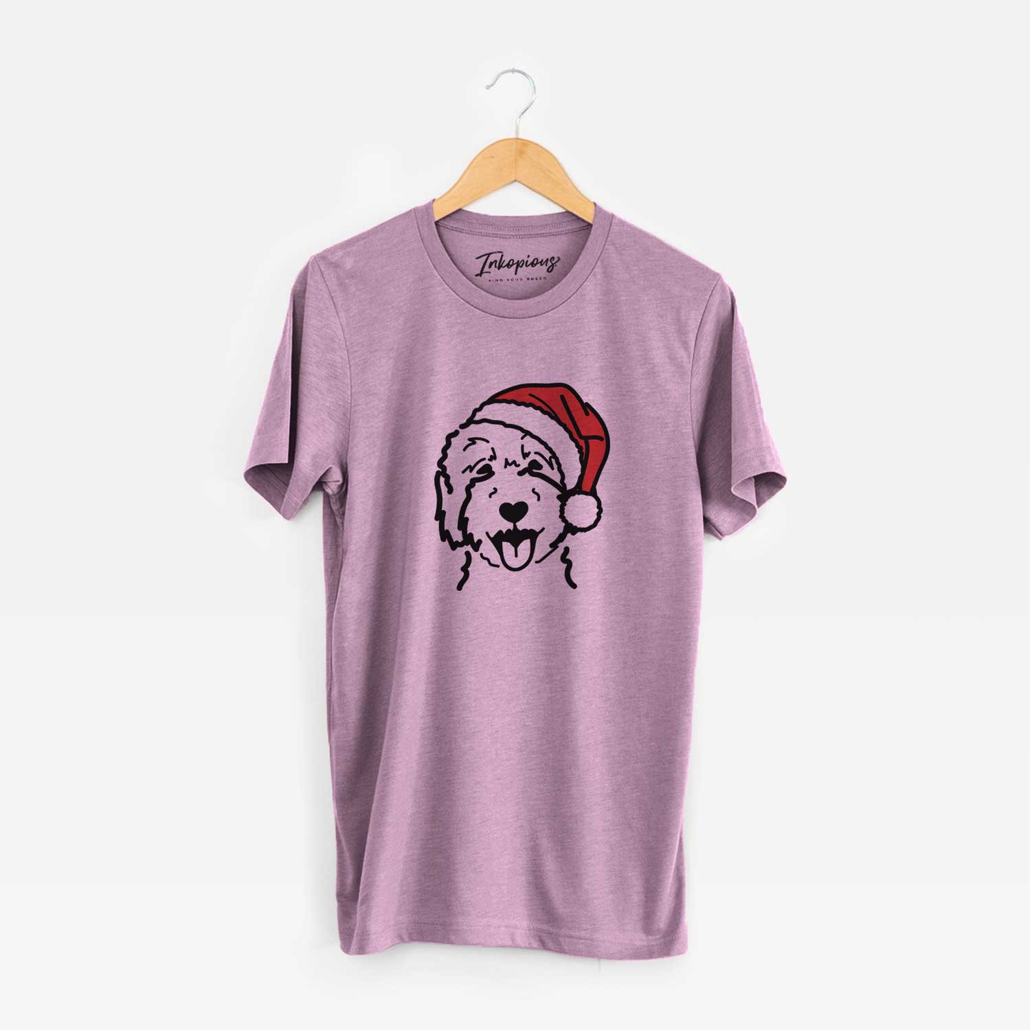 Minimalist line drawing of a Goldendoodle 2 wearing a Santa hat on an Orchid Unisex crewneck