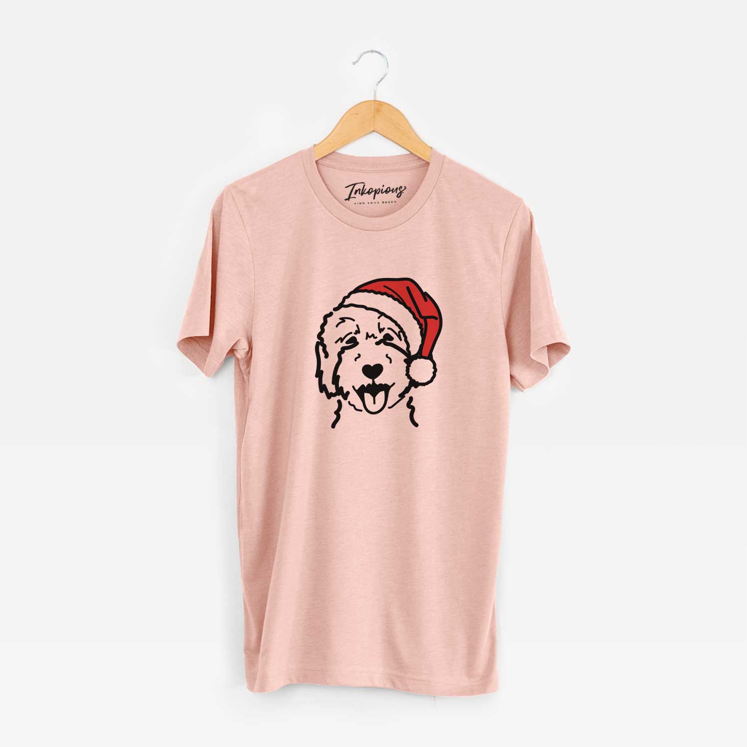 Minimalist line drawing of a Goldendoodle 2 wearing a Santa hat on a Peach Unisex crewneck