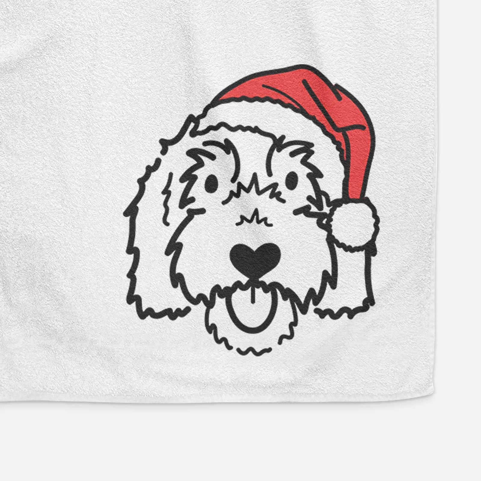 Minimalist line drawing of Gus the Goldendoodle wearing a Santa hat on a decorative hand towel