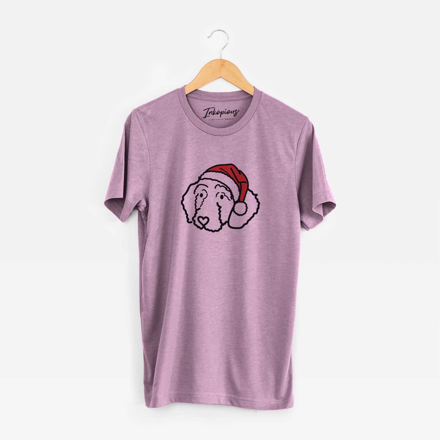 Minimalist line drawing of Hanna the Goldendoodle wearing a Santa hat on an Orchid Unisex crewneck