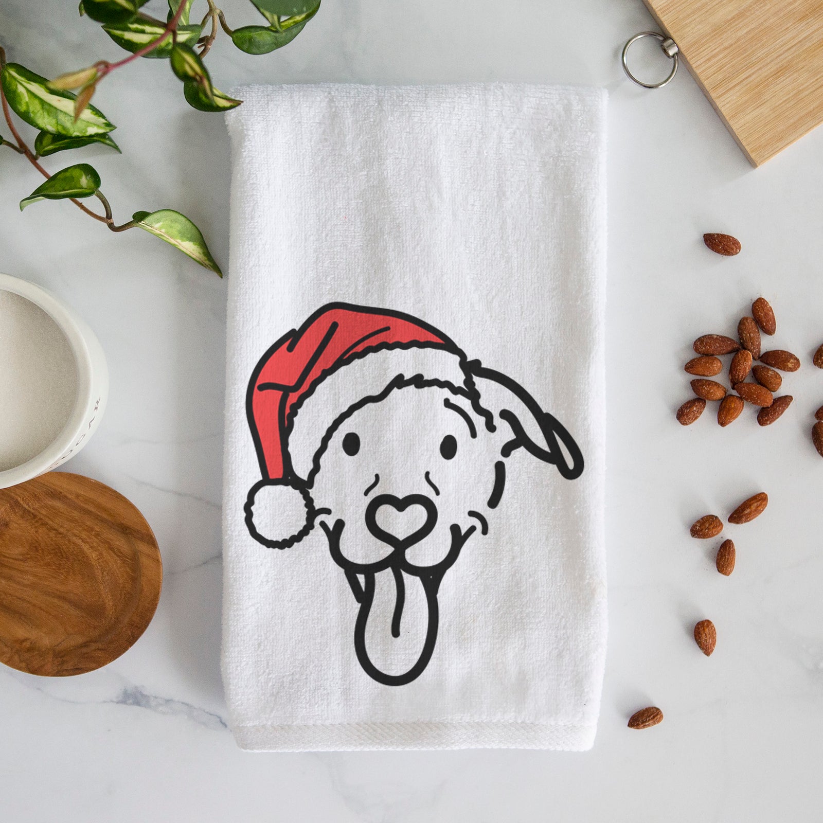 Minimalist line drawing of Hemi the Pitbull Mix wearing a Santa hat on a decorative hand towel