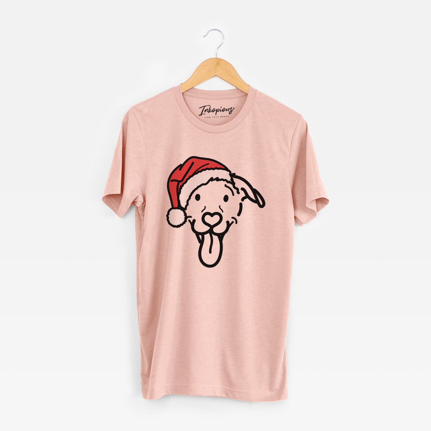 Minimalist line drawing of Hemi the Pitbull Mix wearing a Santa hat on a Peach Unisex crewneck