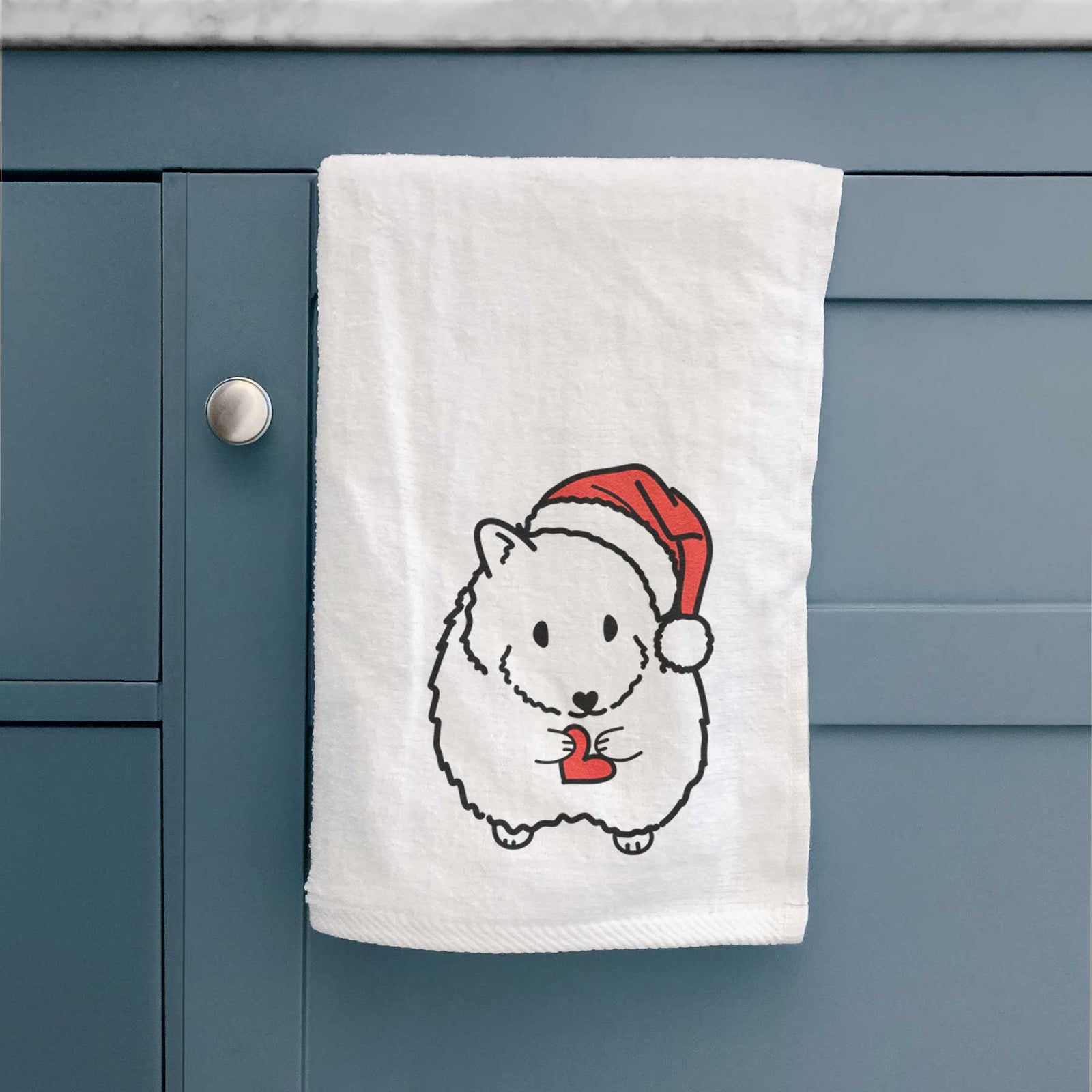 Minimalist line drawing of Hilga the Hamster wearing a Santa hat on a decorative hand towel