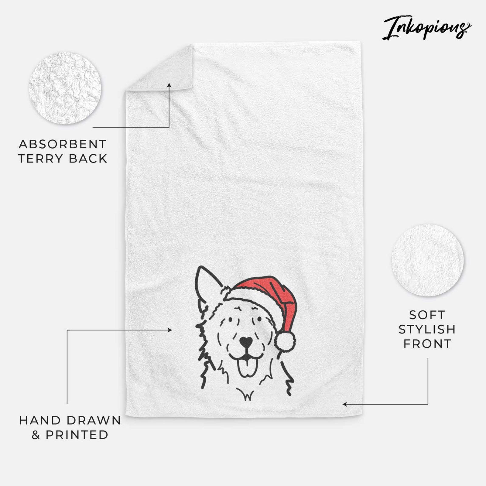 Minimalist line drawing of Jack the Mudi wearing a Santa hat on a decorative hand towel