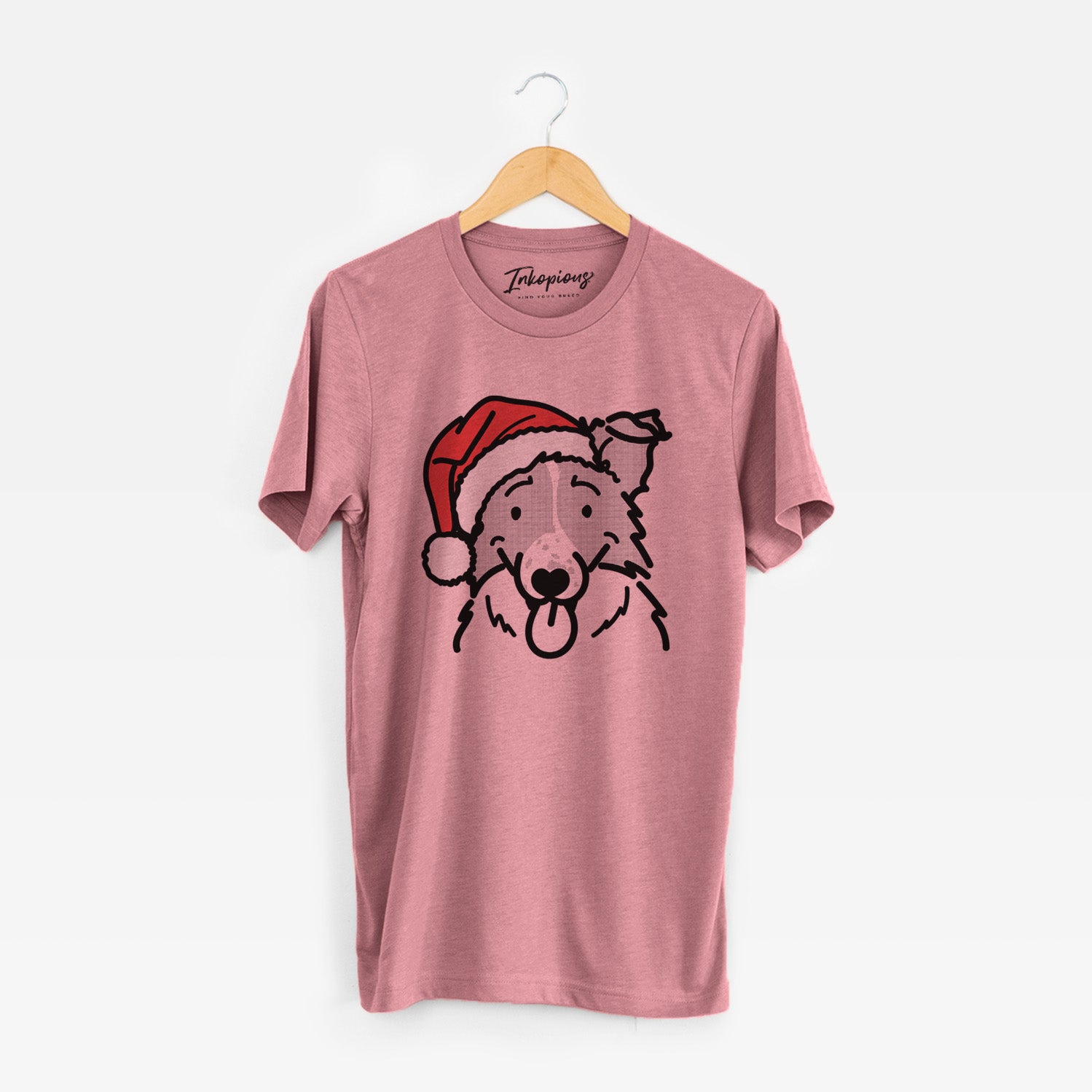 Minimalist line drawing of Jam the Border Collie wearing a Santa hat on a Mauve Unisex crewneck