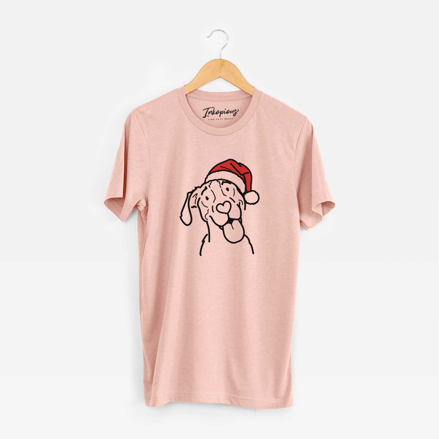 Minimalist line drawing of Kimble the Treeing Walker Coonhound wearing a Santa hat on a Peach Unisex crewneck