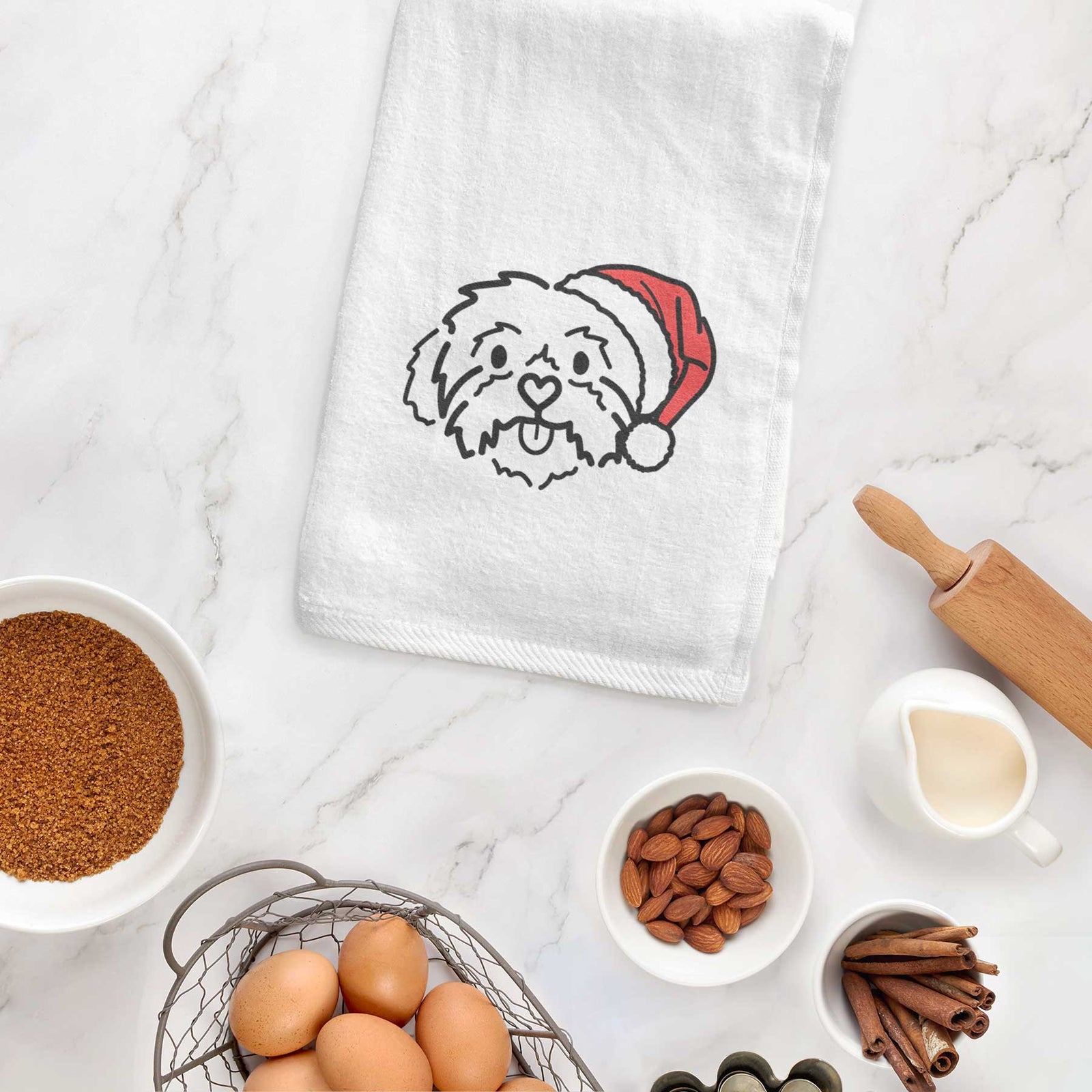 Minimalist line drawing of Leo the Shih Tzu wearing a Santa hat on a decorative hand towel