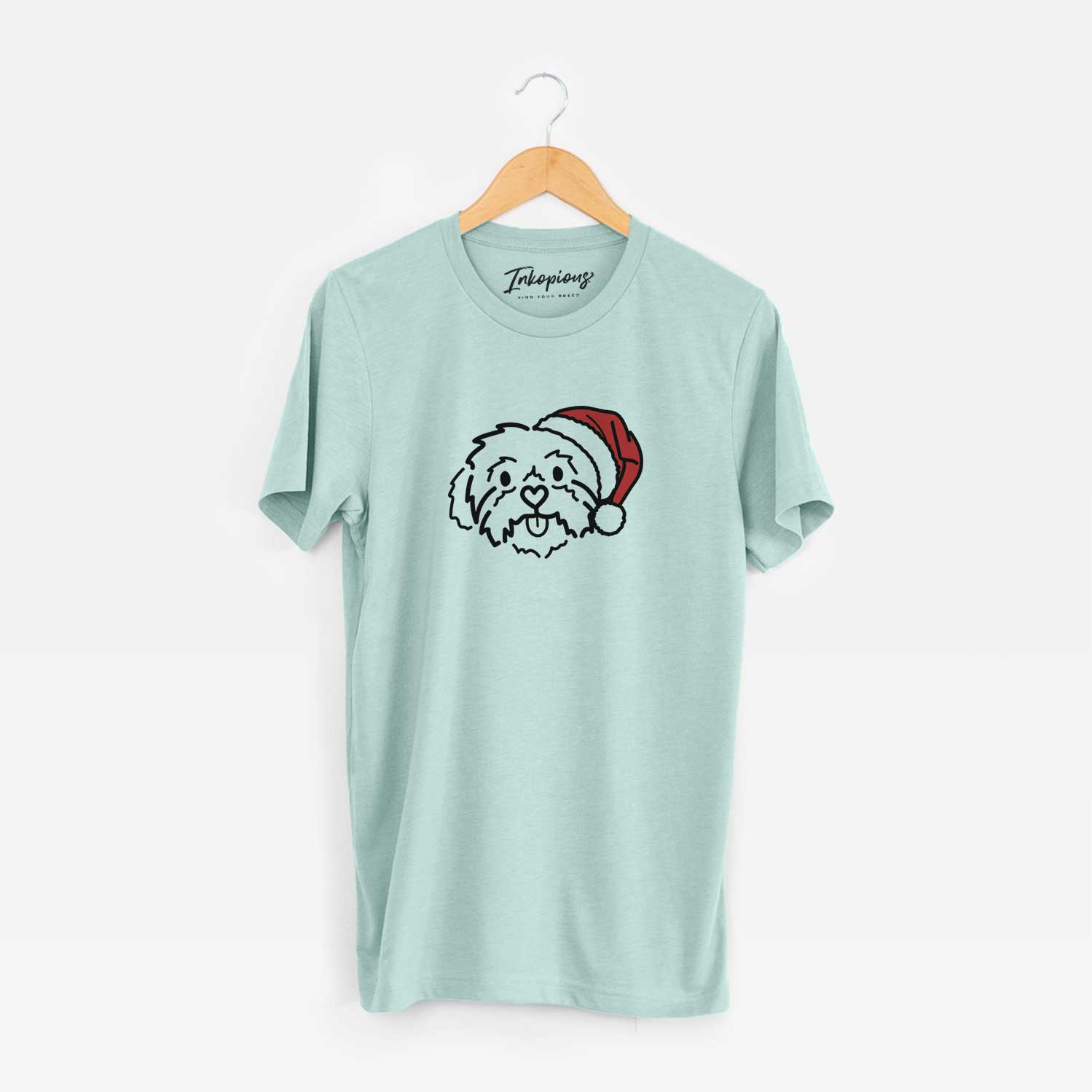 Minimalist line drawing of Leo the Shih Tzu wearing a Santa hat on a Heather Sage Unisex crewneck